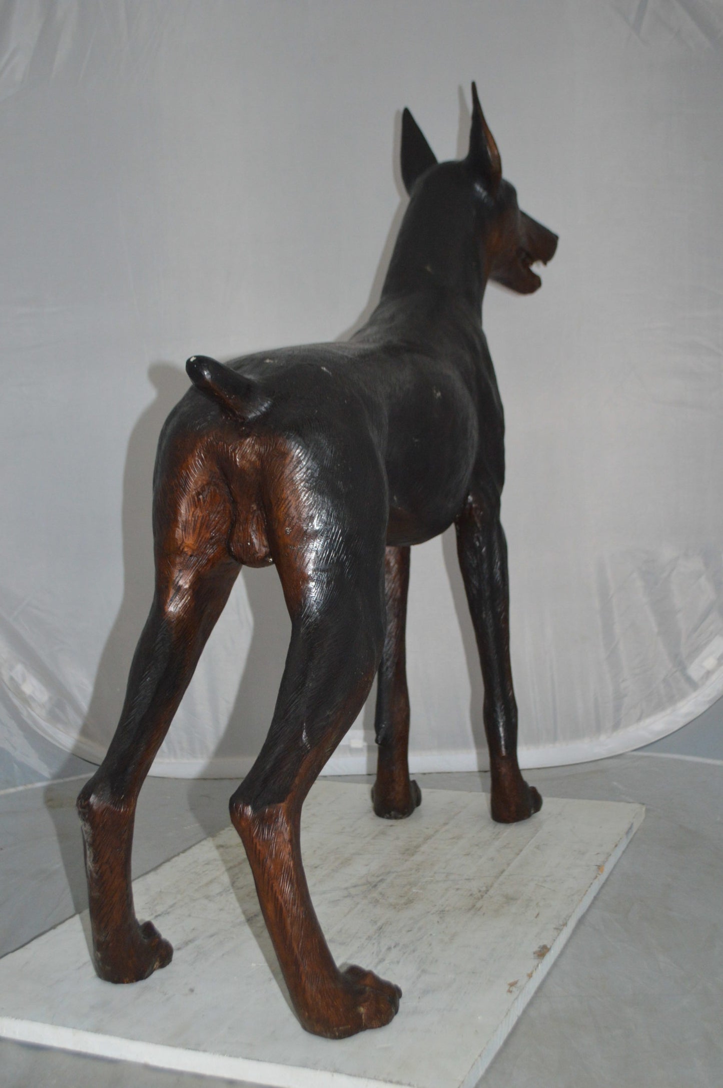 Doberman Dog Bronze Statue -  Size: 36"L x 9"W x 38"H.