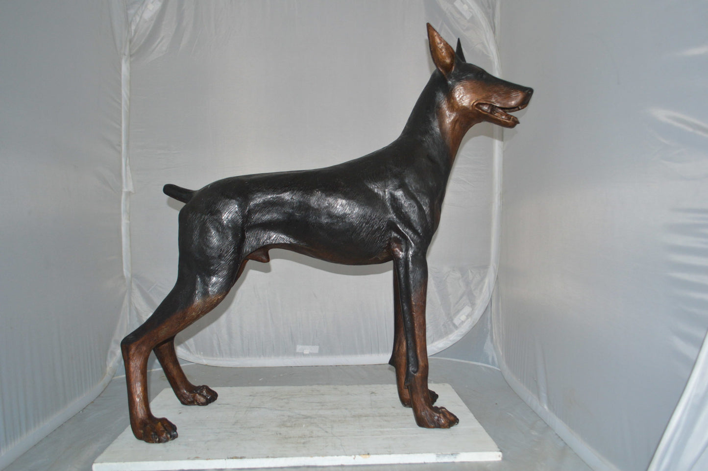 Doberman Dog Bronze Statue -  Size: 36"L x 9"W x 38"H.