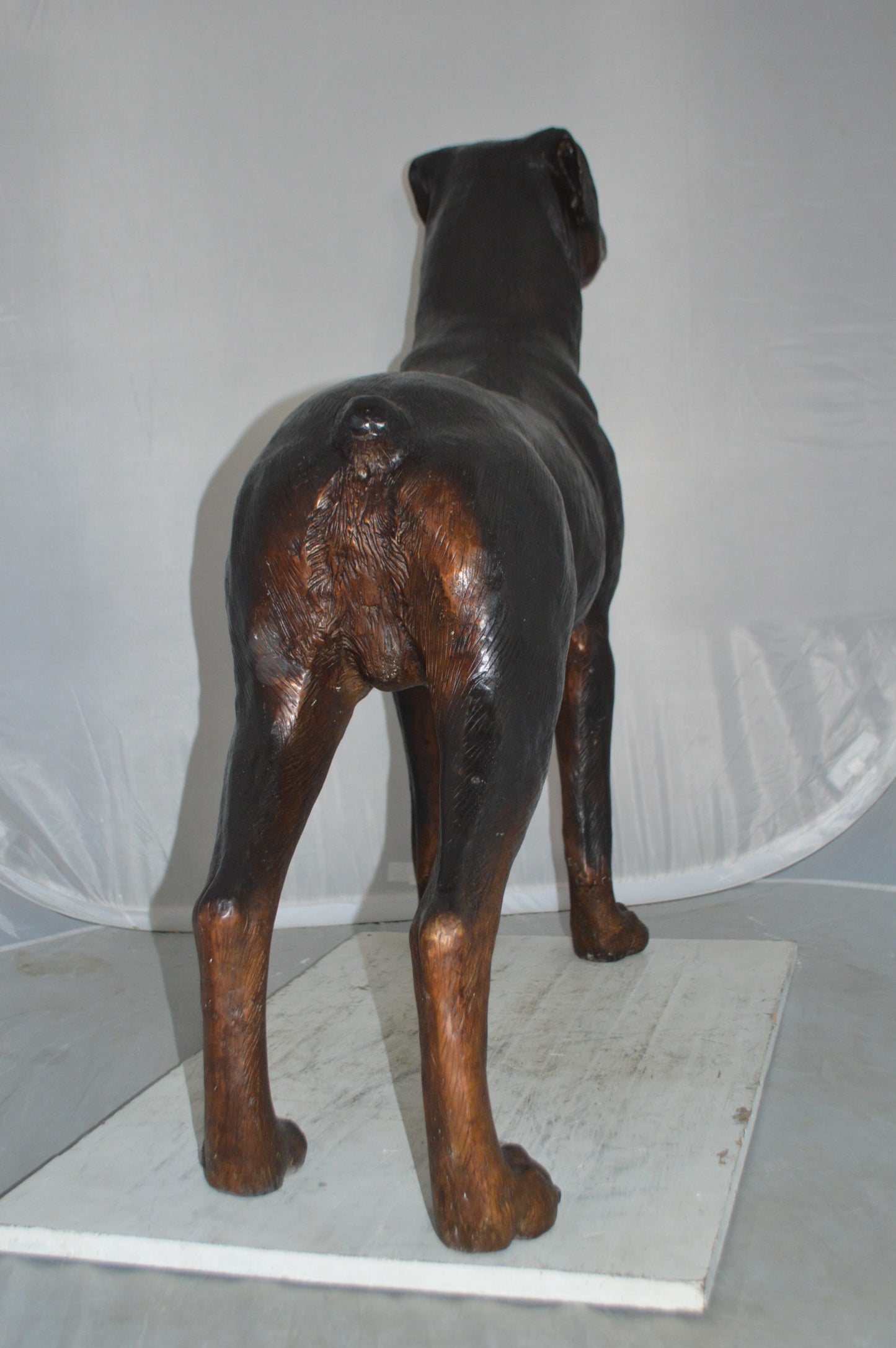 Rottweiler Dog Bronze Statue - Size: 44"L x 10"W x 36"H.