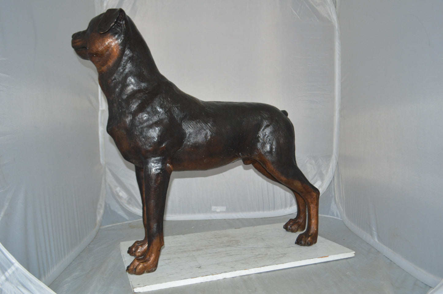 Rottweiler Dog Bronze Statue - Size: 44"L x 10"W x 36"H.