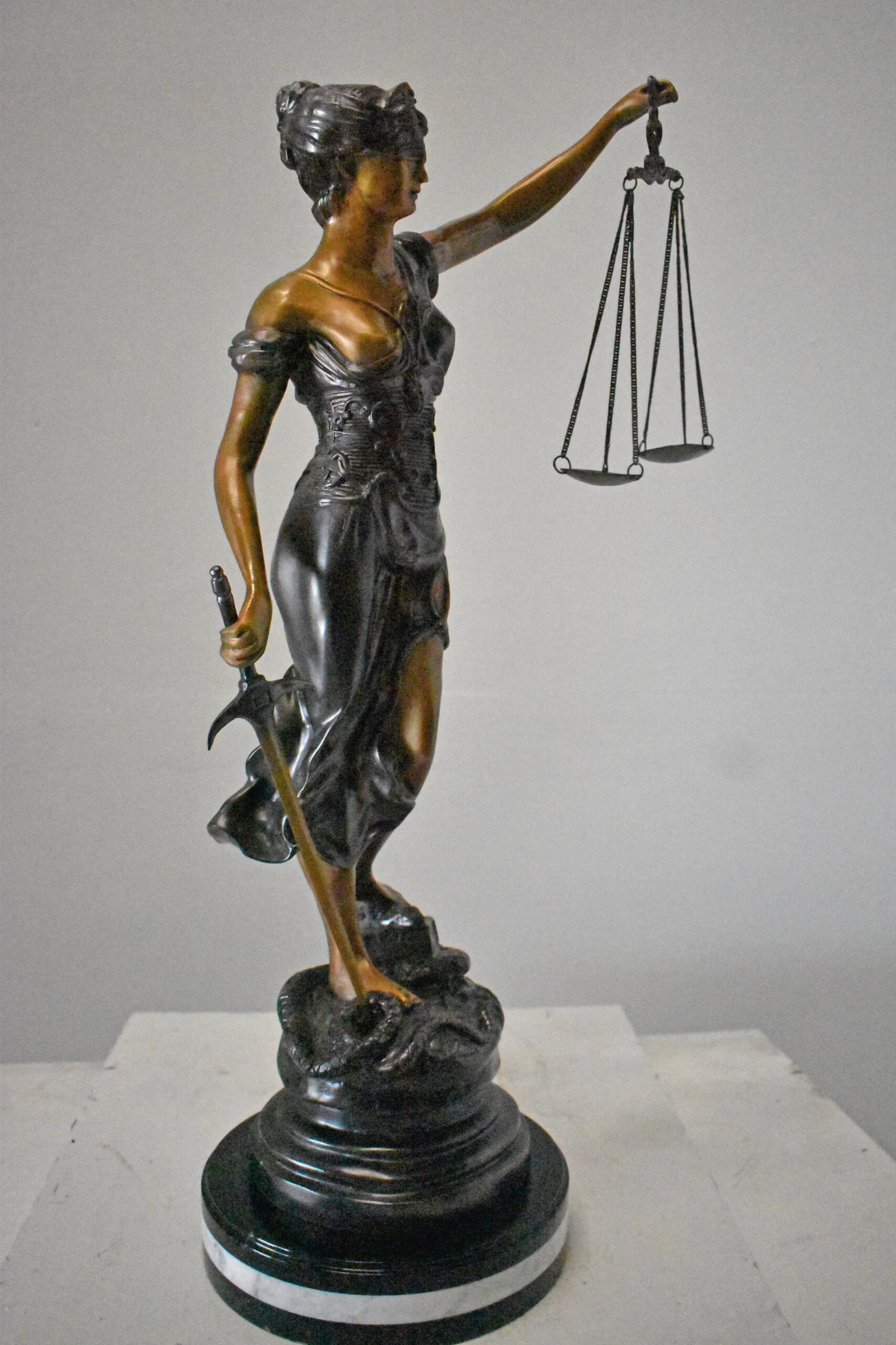 Lady Justice bronze statue mounted on a marble - Size: 14"L x 16"W x 32"H.
