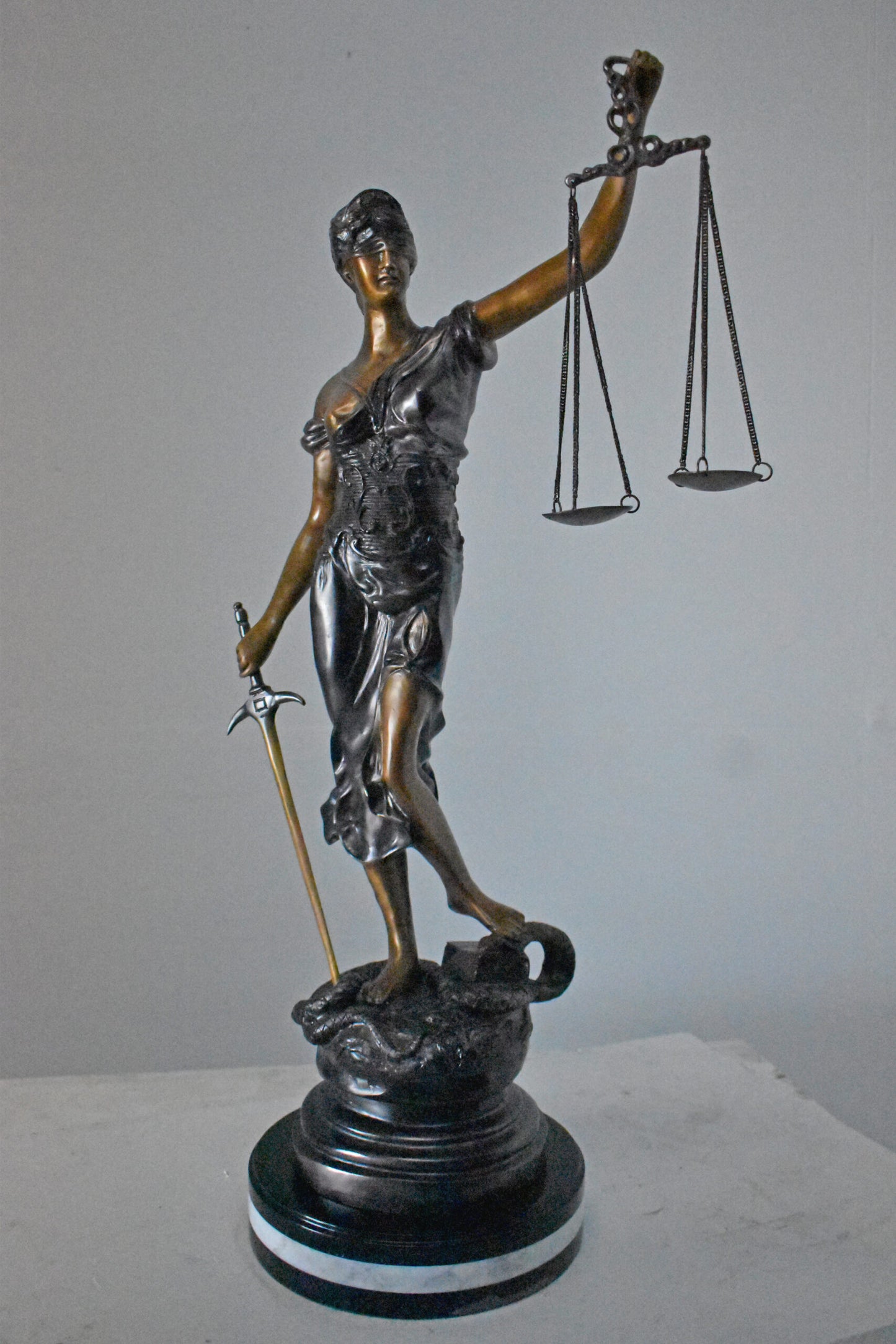 Lady Justice bronze statue mounted on a marble - Size: 14"L x 16"W x 32"H.