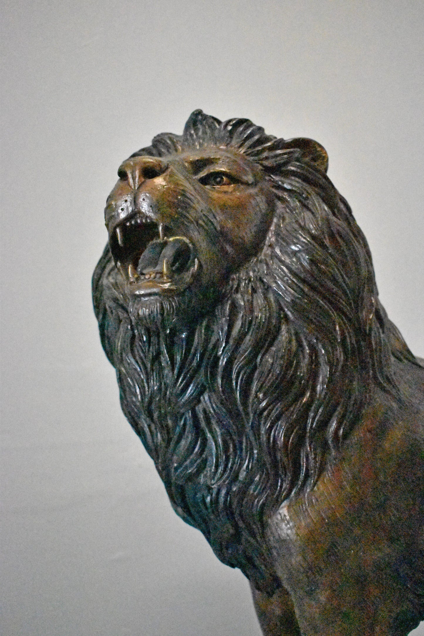 Pair of Standing Lions Bronze Statues - Size: 26"L x 11"W x 25"H.