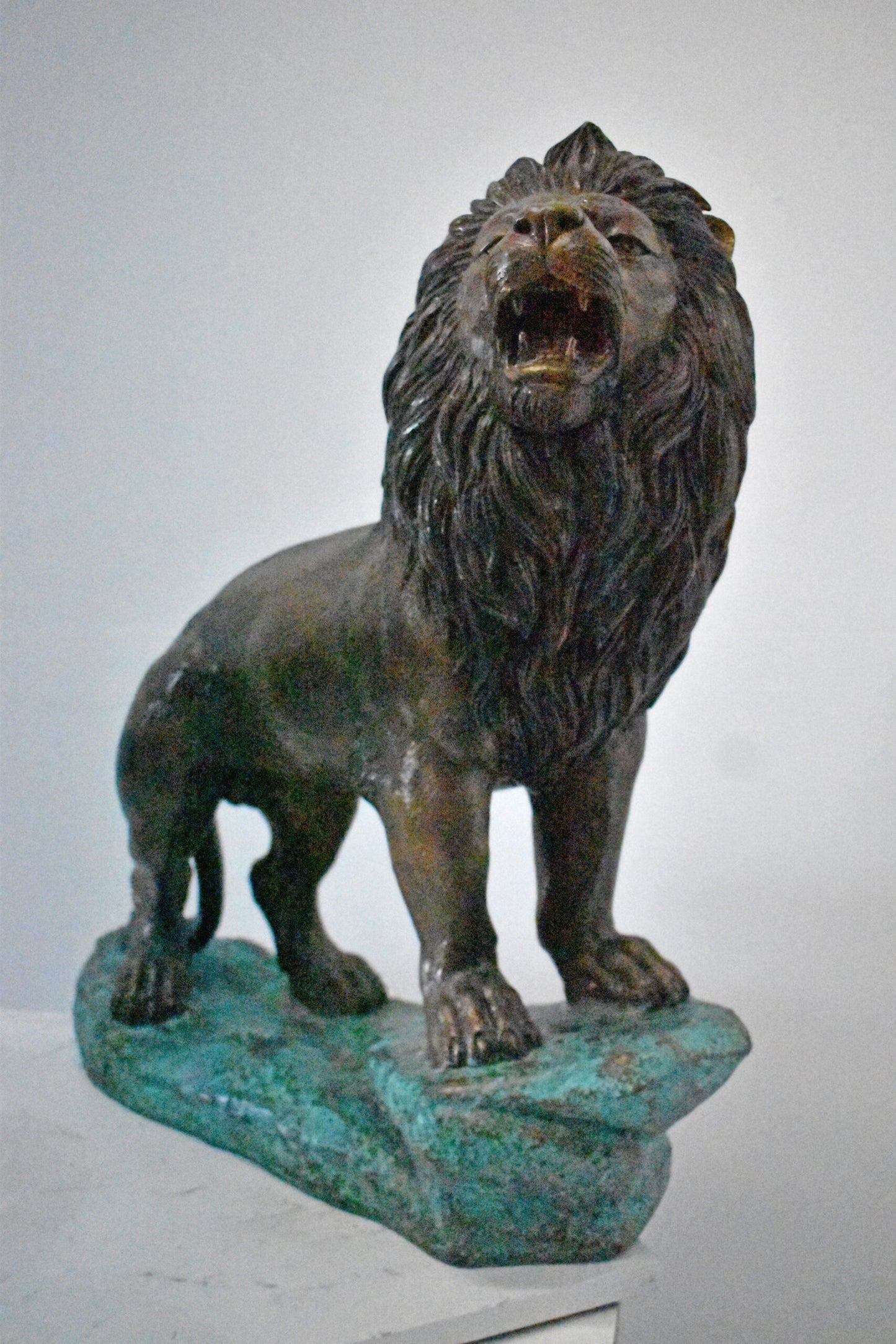 Pair of Standing Lions Bronze Statues - Size: 26"L x 11"W x 25"H.