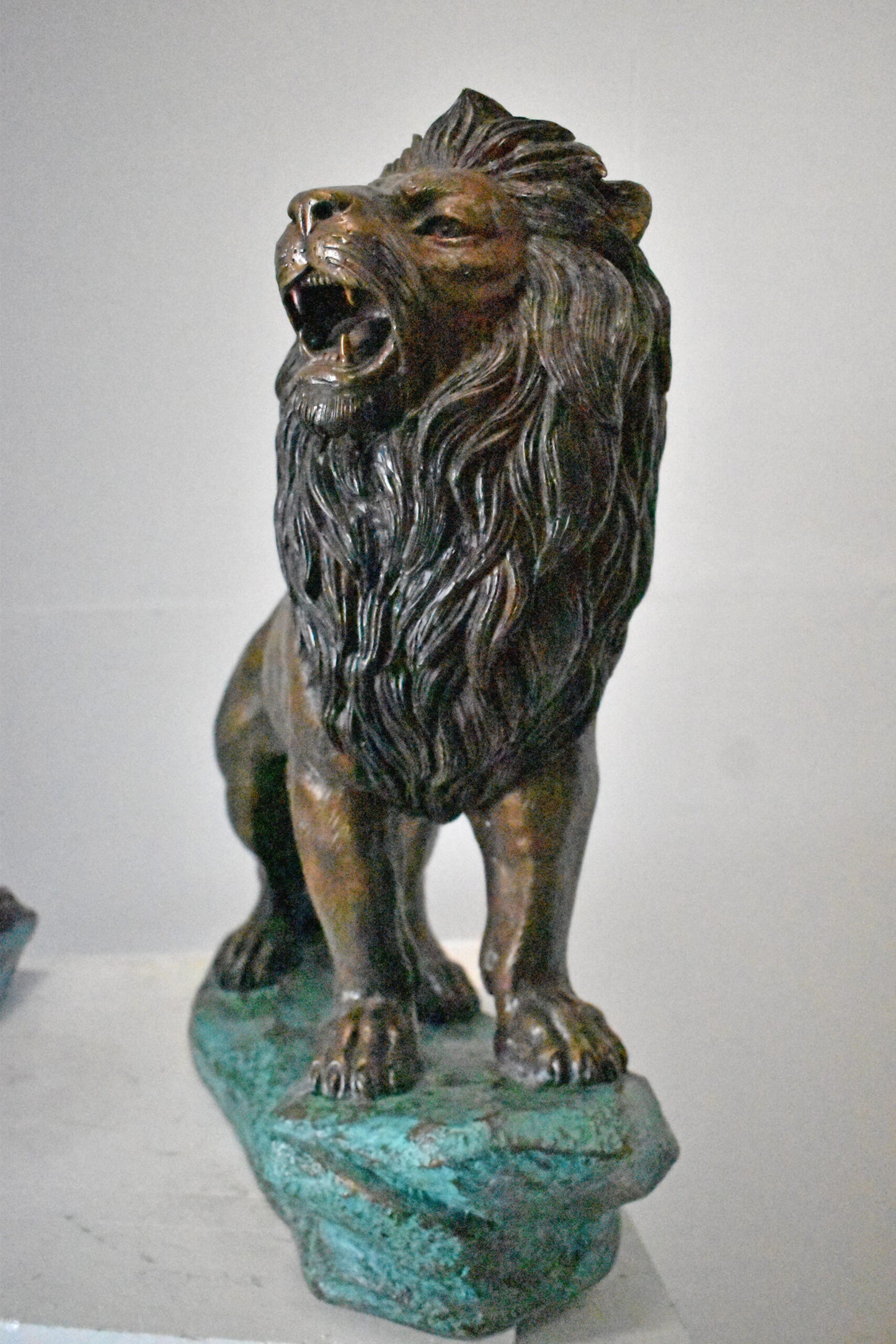 Pair of Standing Lions Bronze Statues - Size: 26"L x 11"W x 25"H.