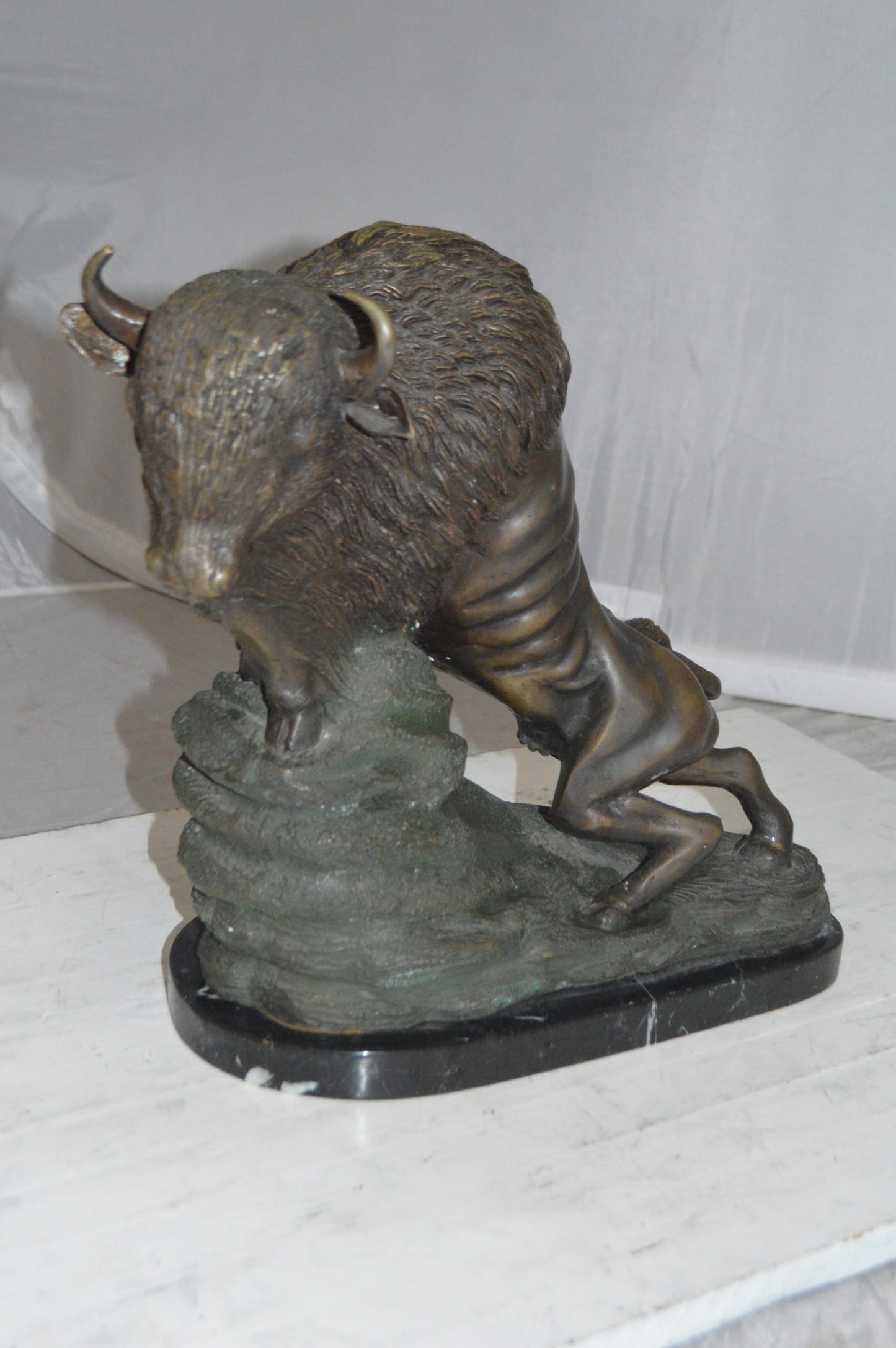 Bison Bronze Statue - Size: 7"L x 14"W x 15"H.