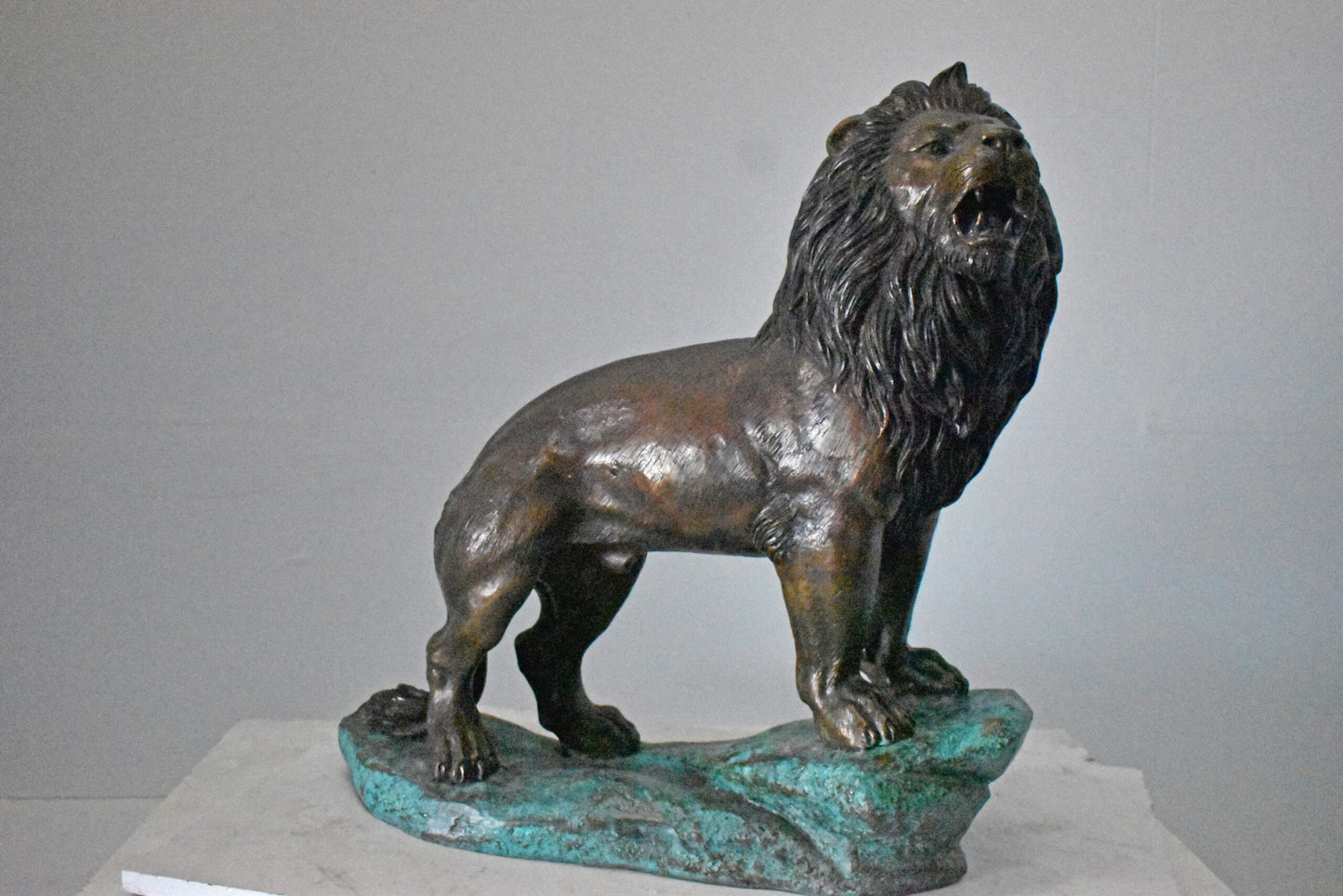 Pair of Standing Lions Bronze Statues - Size: 26"L x 11"W x 25"H.