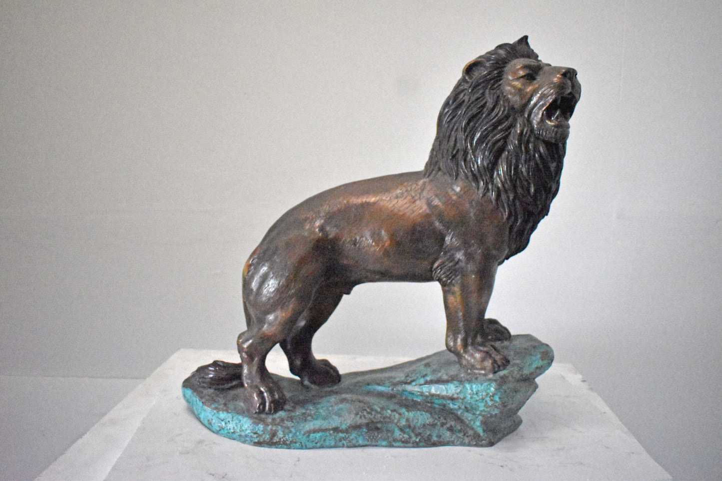 Pair of Standing Lions Bronze Statues - Size: 26"L x 11"W x 25"H.