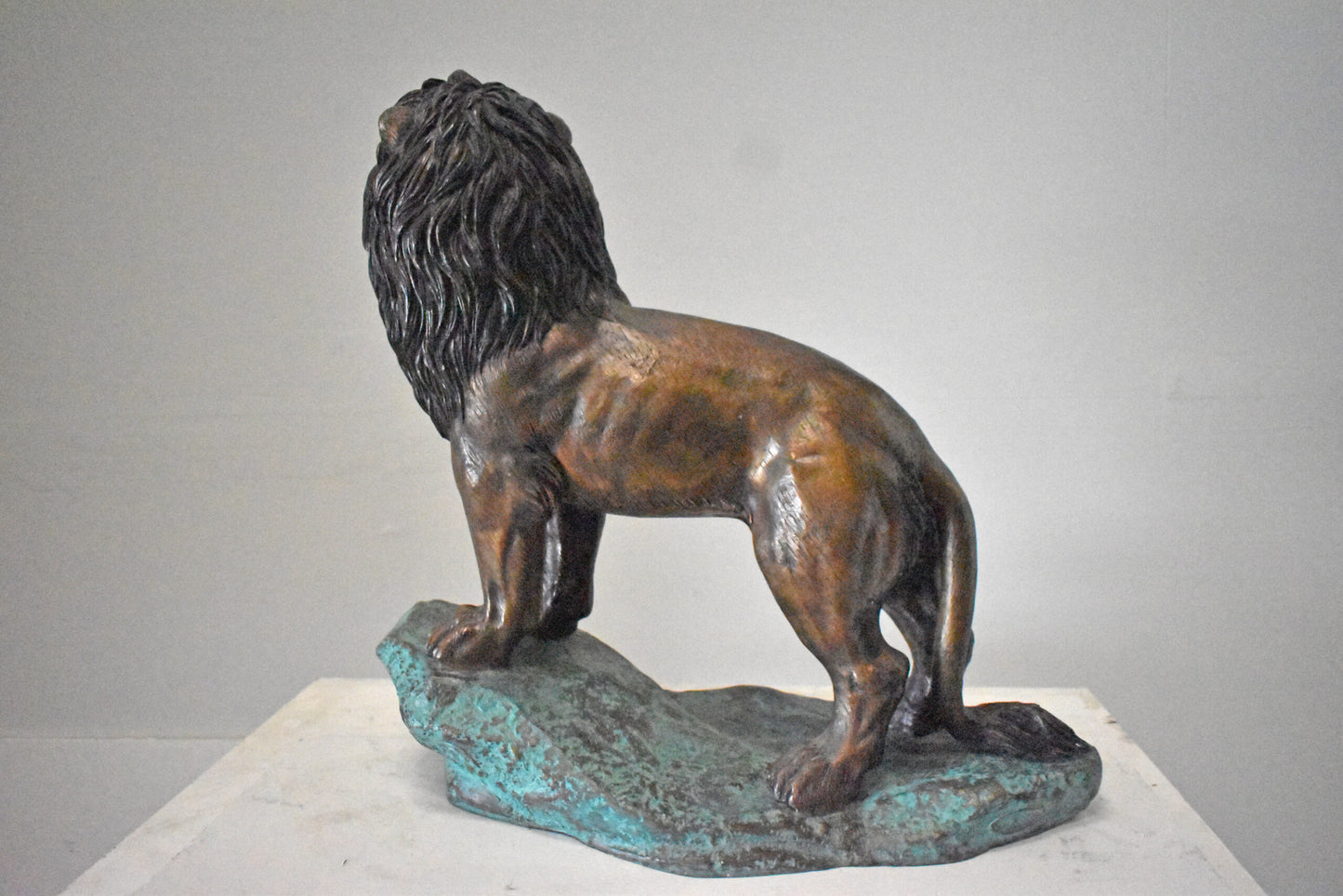 Pair of Standing Lions Bronze Statues - Size: 26"L x 11"W x 25"H.