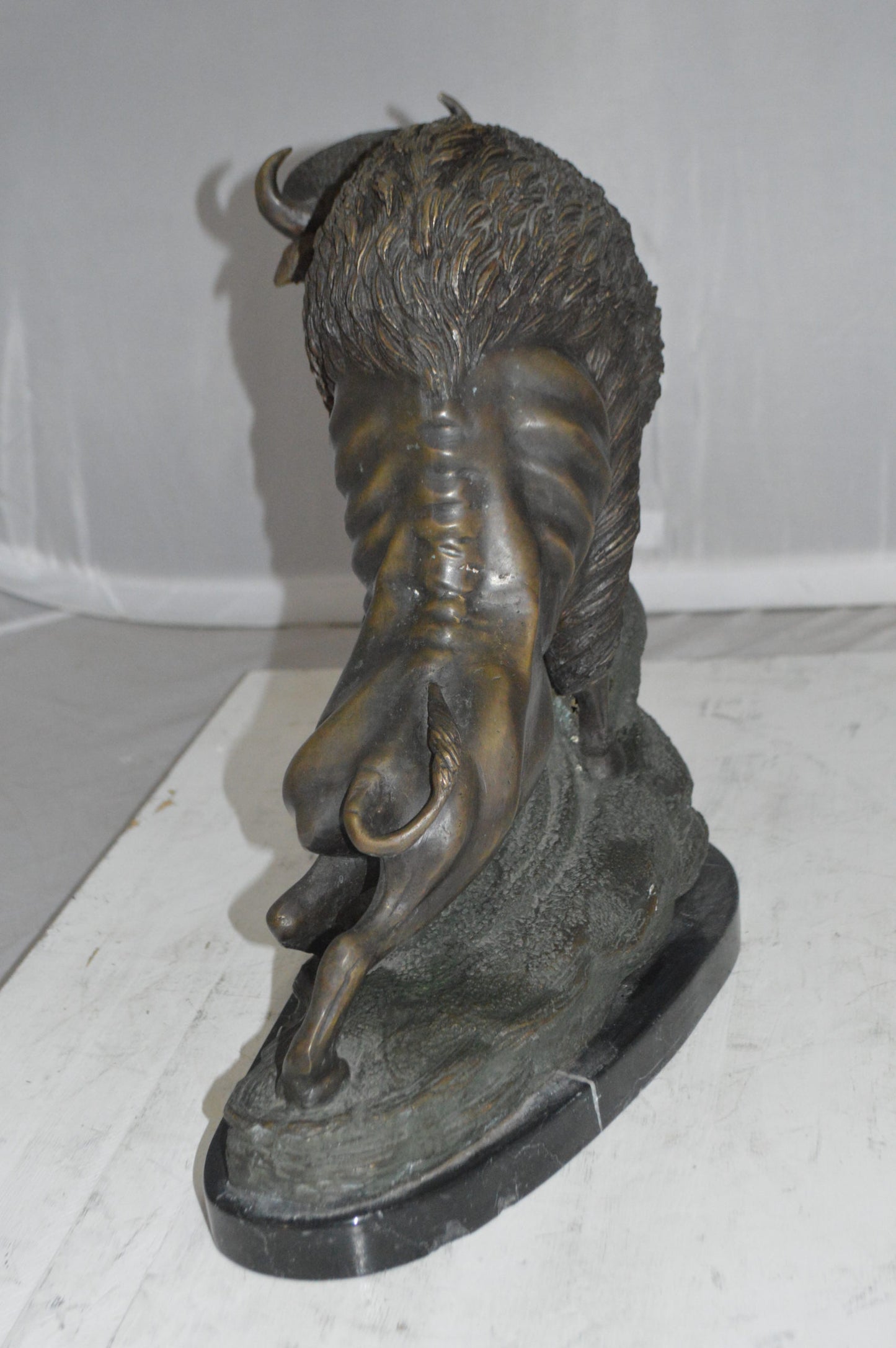 Bison Bronze Statue - Size: 7"L x 14"W x 15"H.