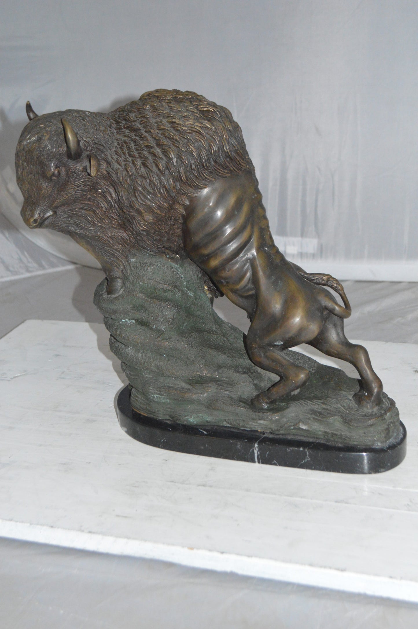 Bison Bronze Statue - Size: 7"L x 14"W x 15"H.