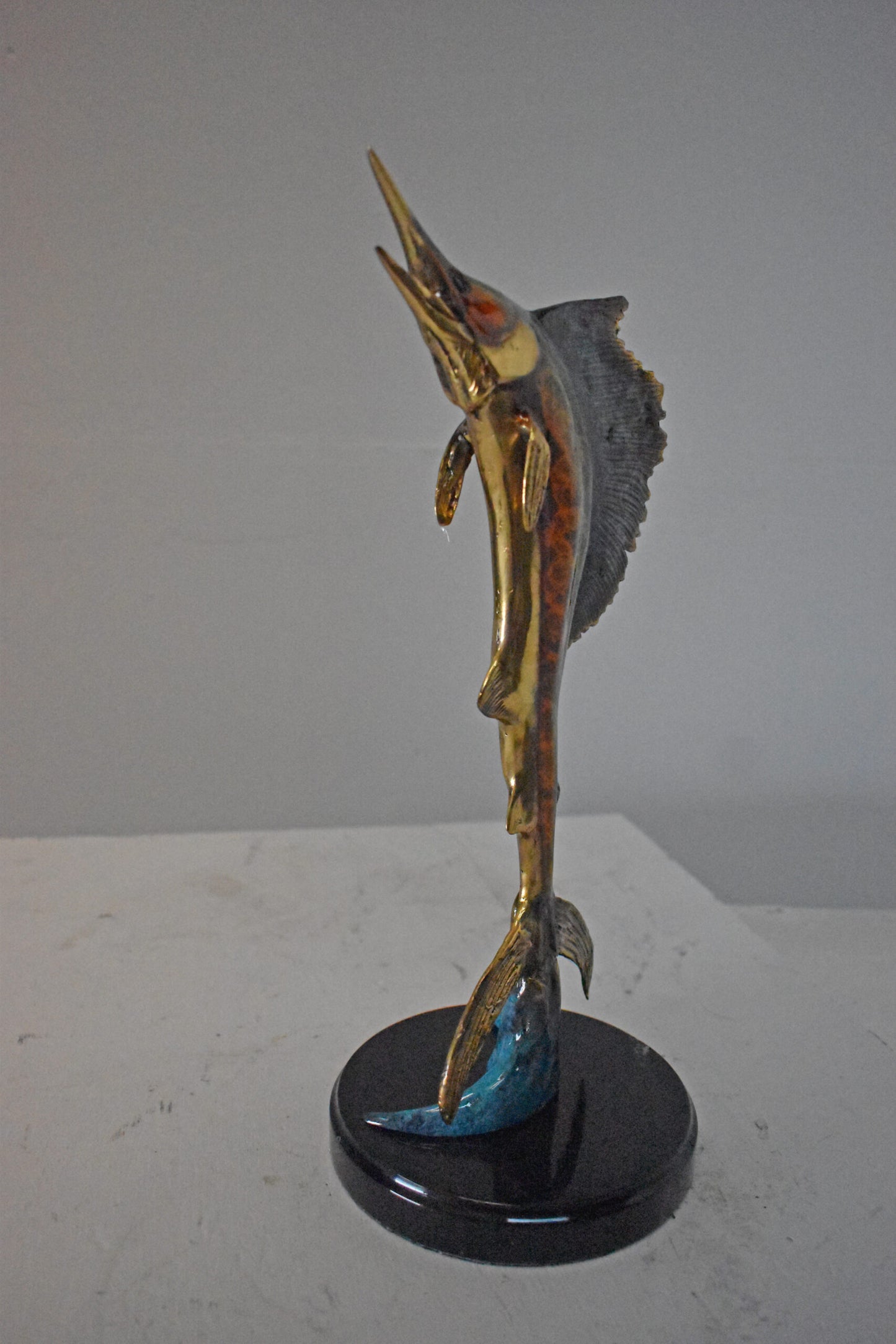 Single Sailfish Bronze Statue Mounted on Round Marble - Size: 6"L x 6"W x 15"H.