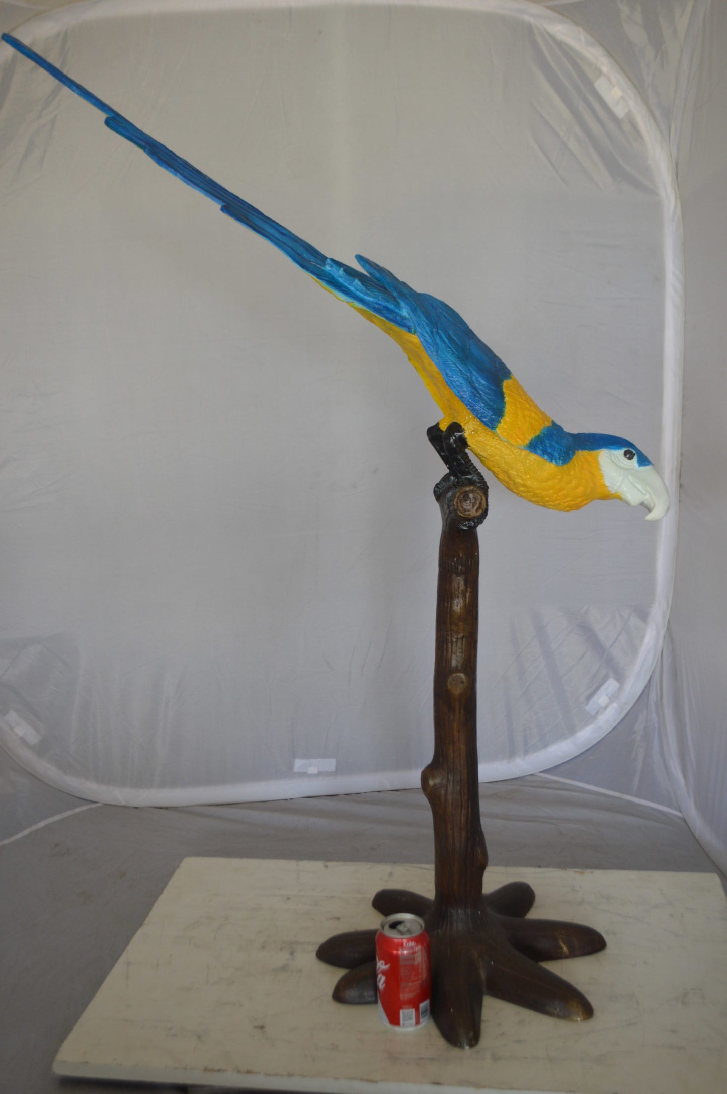 Parrot on Tree - Head Down Bronze Statue - Size: 39"L x 15"W x 47"H.