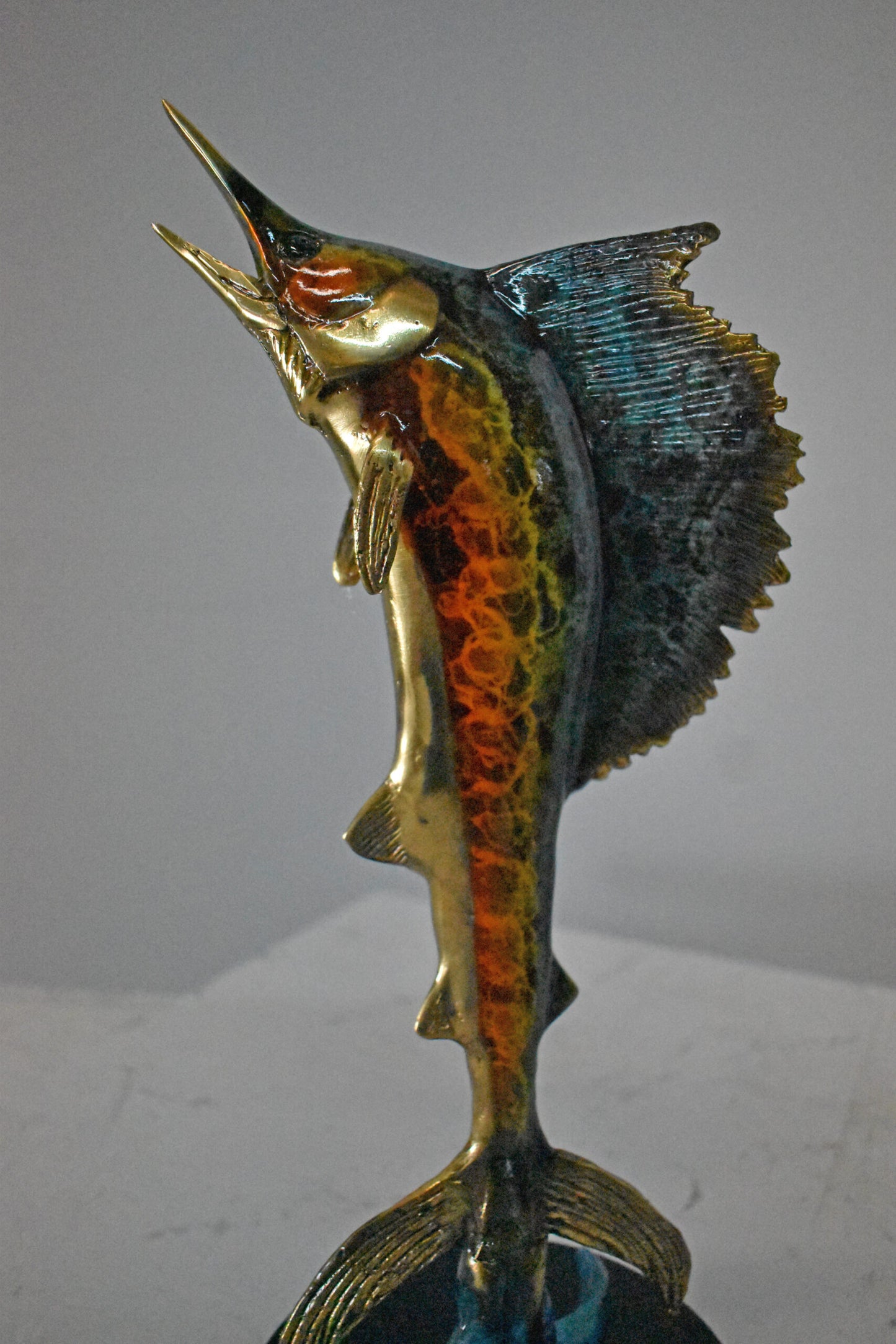 Single Sailfish Bronze Statue Mounted on Round Marble - Size: 6"L x 6"W x 15"H.