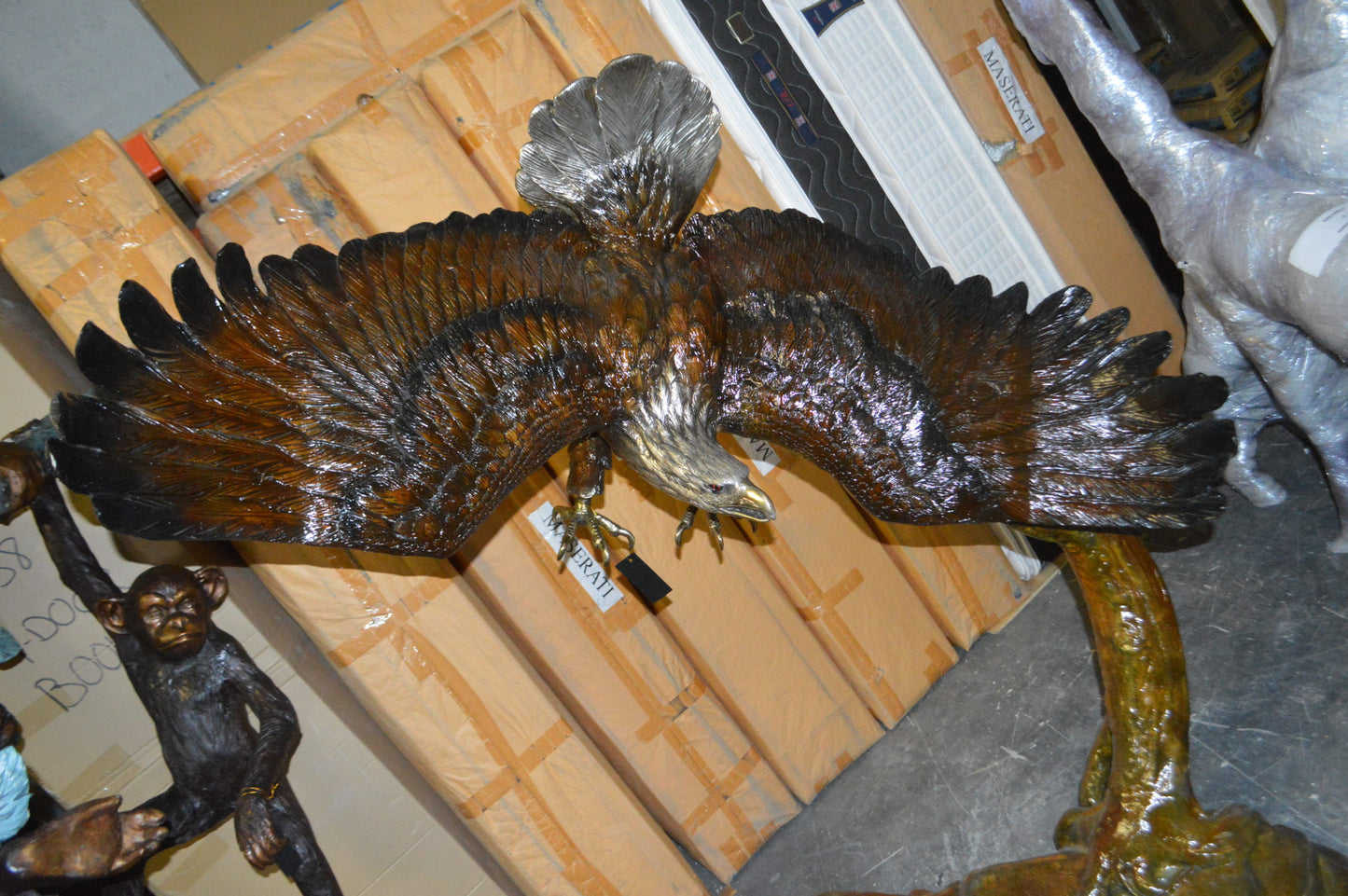 Eagle Flying To The Right Bronze Statue - Size: 22"L x 63"W x 67"H.