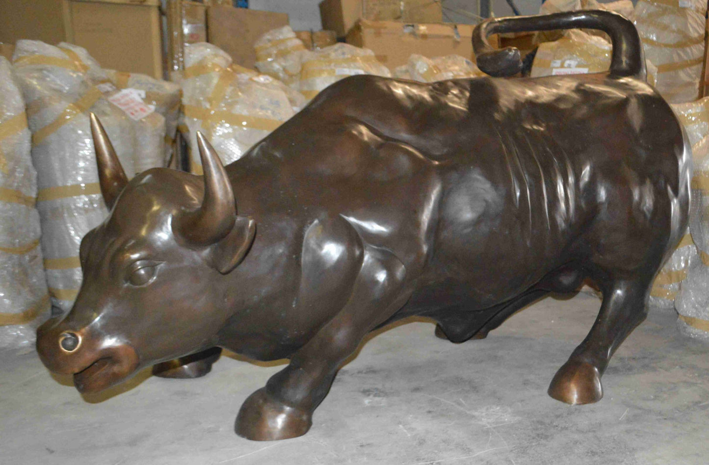 Wall Street Bull - Giant Bronze Statue  -  Size: 30"L x 82"W x 47"H.