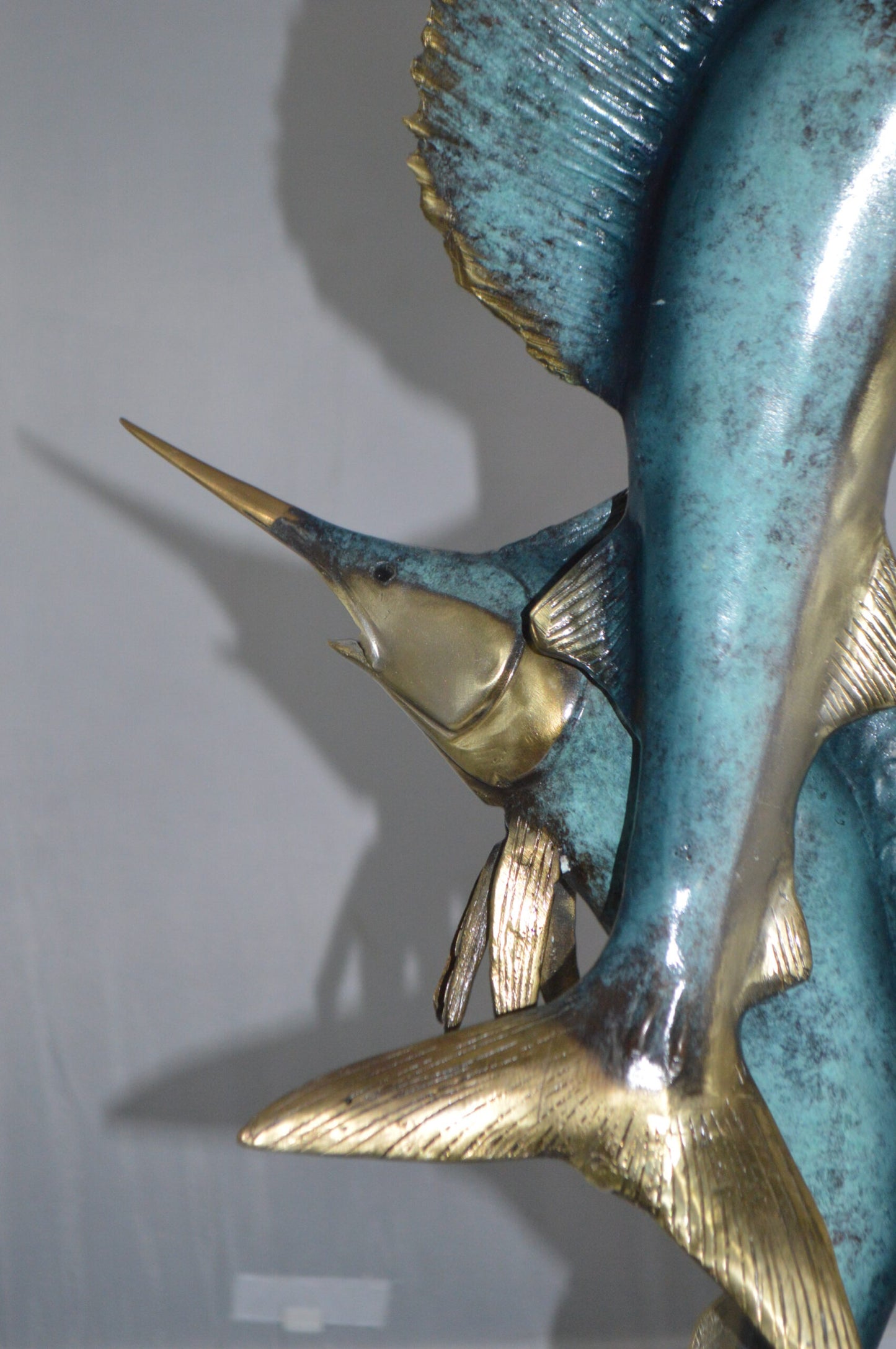 Two Sailfish jumping of water bronze statue - Size: 13"L x 6"W x 28"H.