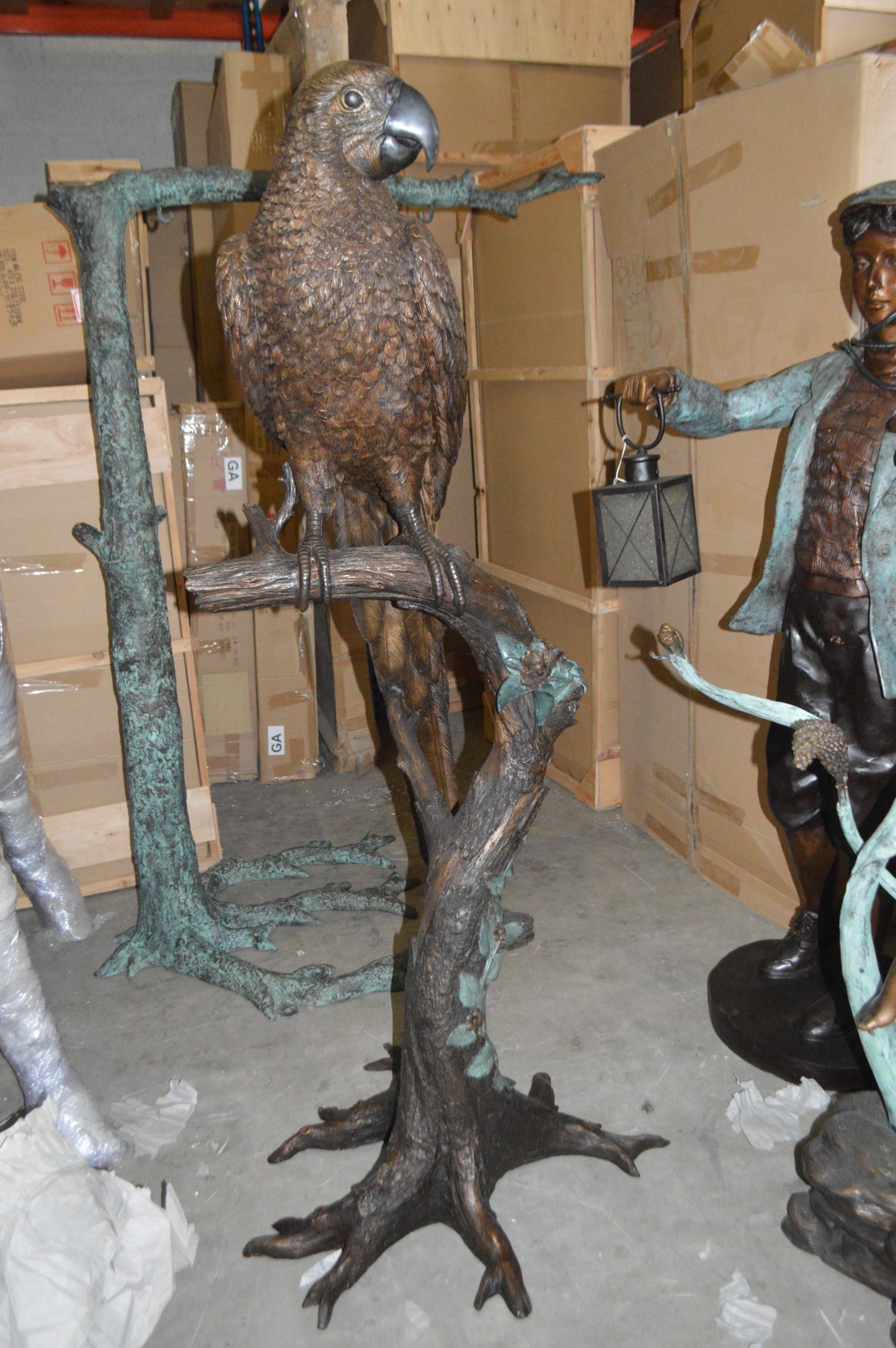 Parrot On A Tree Bronze Statue - Size: 30"L x 24"W x 66"H.
