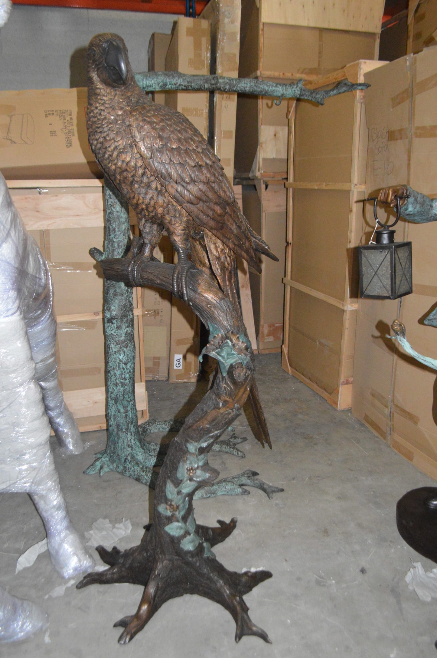 Parrot On A Tree Bronze Statue - Size: 30"L x 24"W x 66"H.