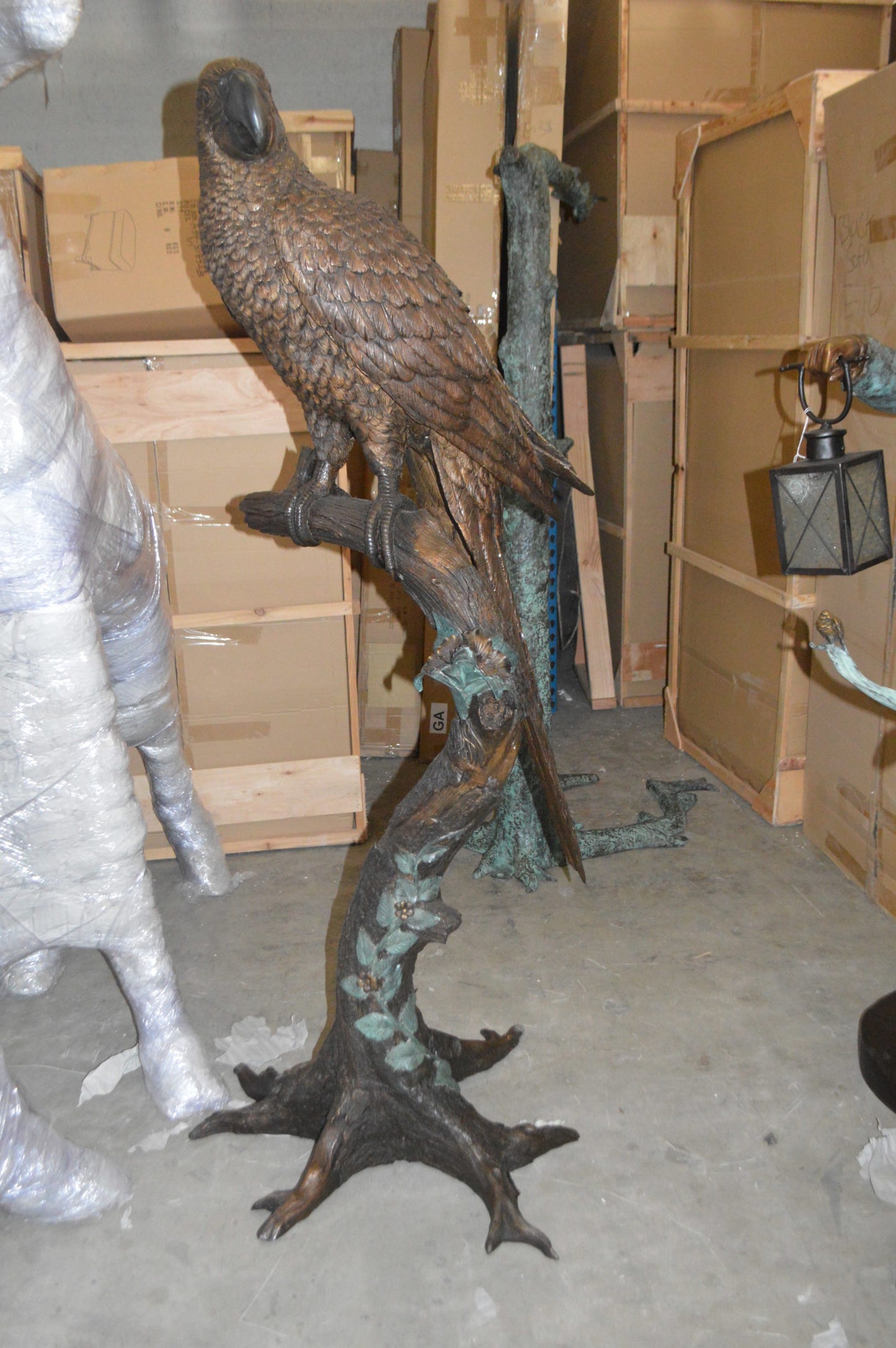 Parrot On A Tree Bronze Statue - Size: 30"L x 24"W x 66"H.