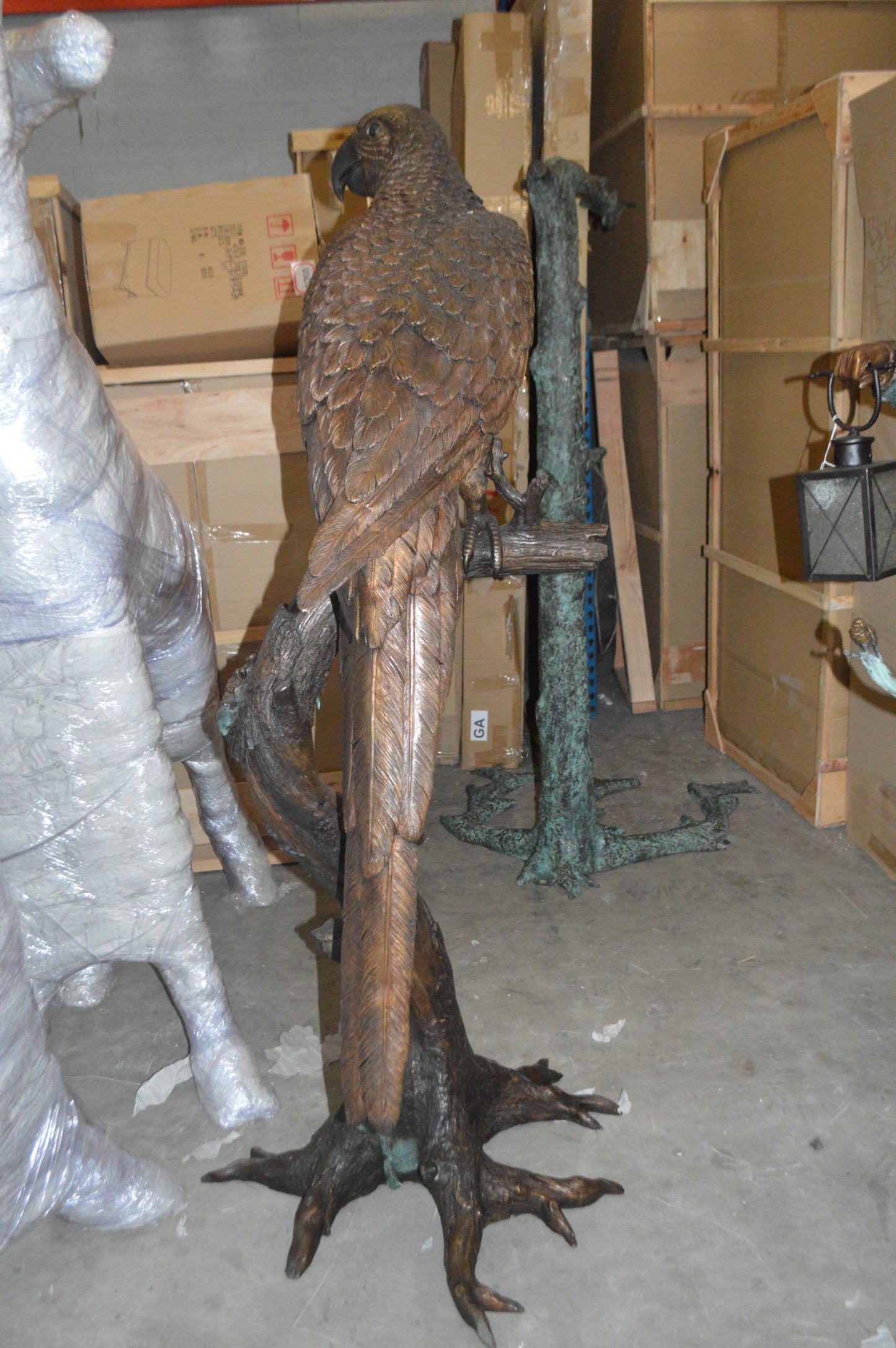 Parrot On A Tree Bronze Statue - Size: 30"L x 24"W x 66"H.