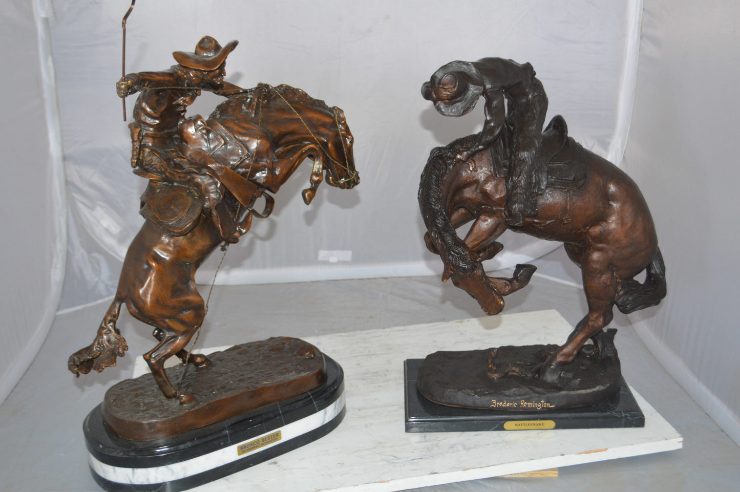 Bronco Buster by Remington Bronze Statue on a triple marble - 21"x 10"x 26"H.
