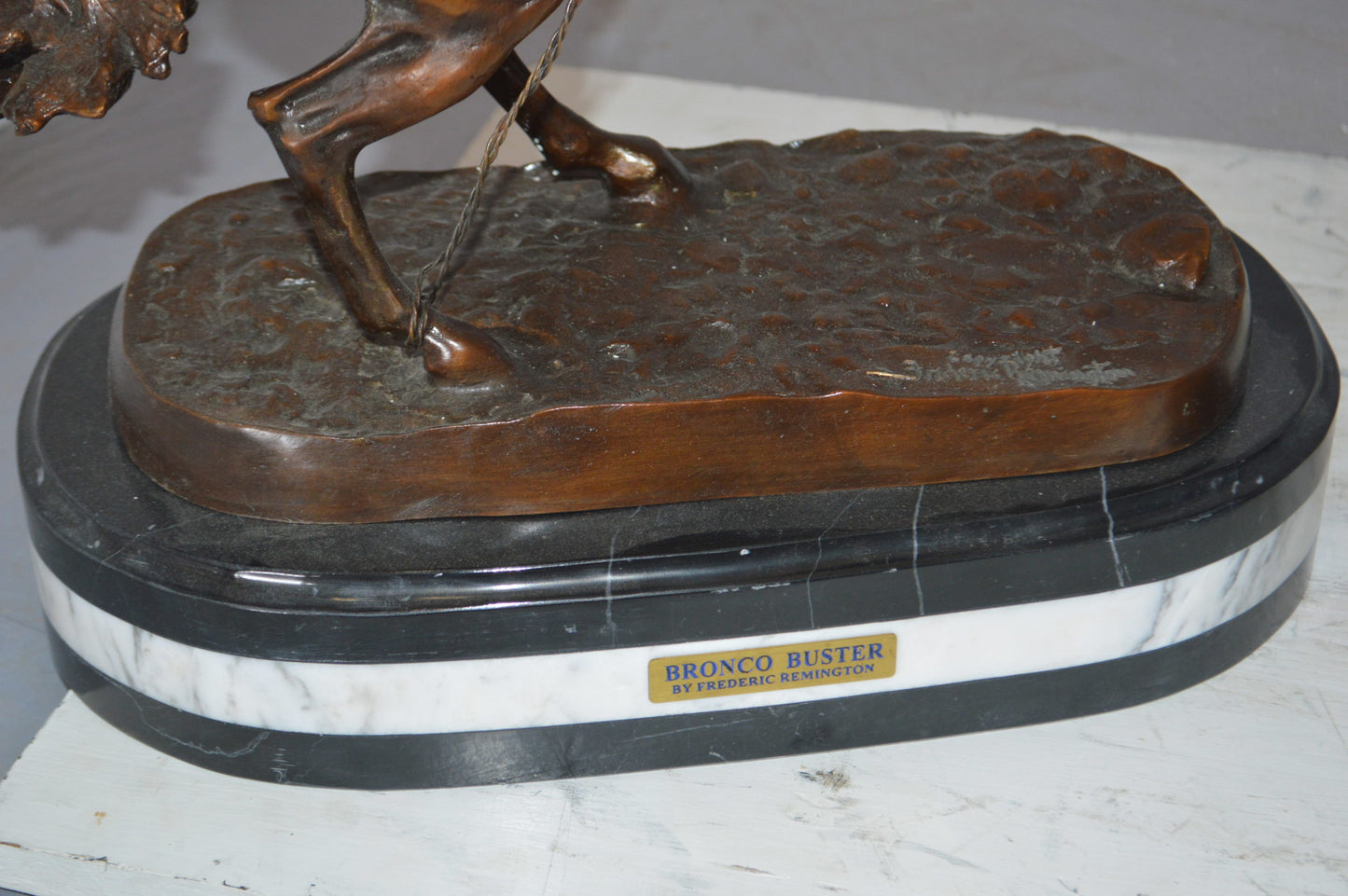 Bronco Buster by Remington Bronze Statue on a triple marble - 21"x 10"x 26"H.