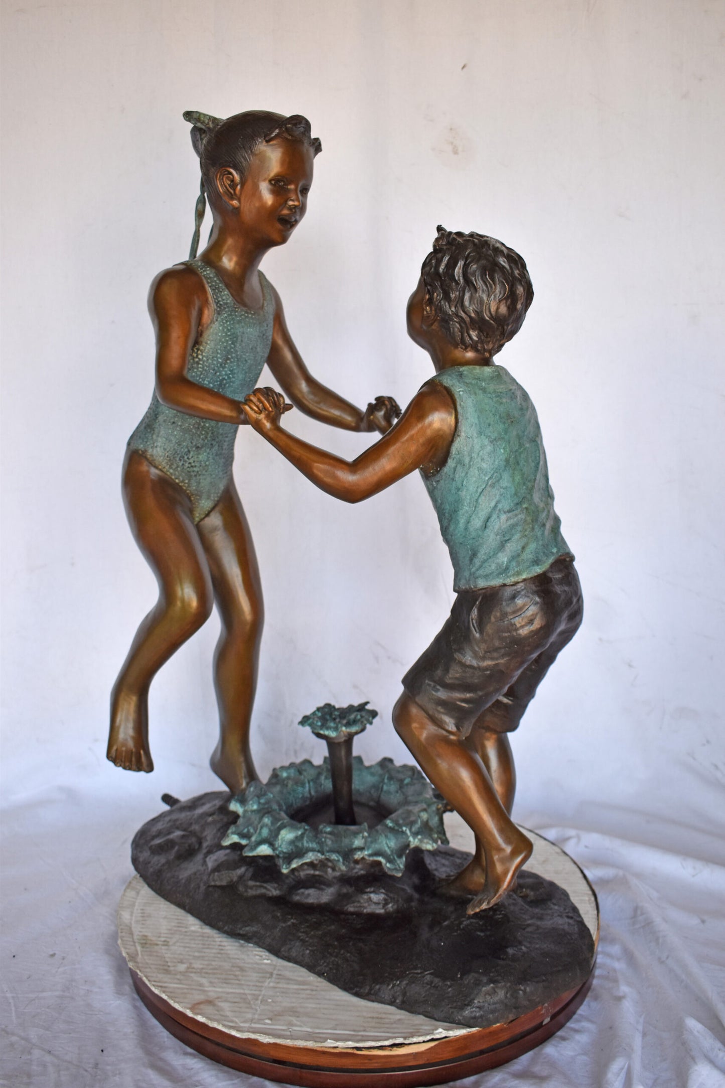 Young Boy and girl dancing around fountain bronze statue-Size 28" x 13" x 38"H