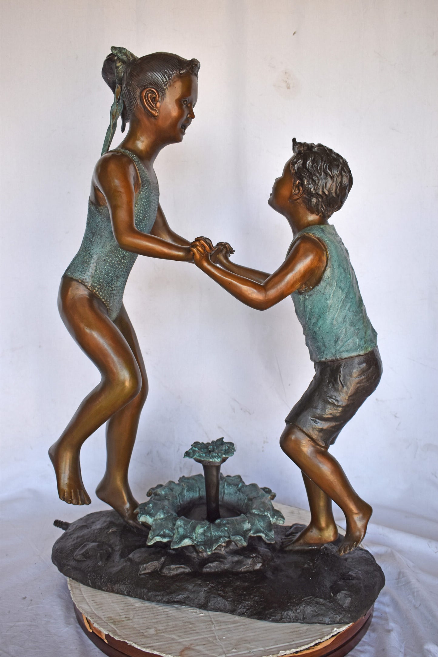 Young Boy and girl dancing around fountain bronze statue-Size 28" x 13" x 38"H