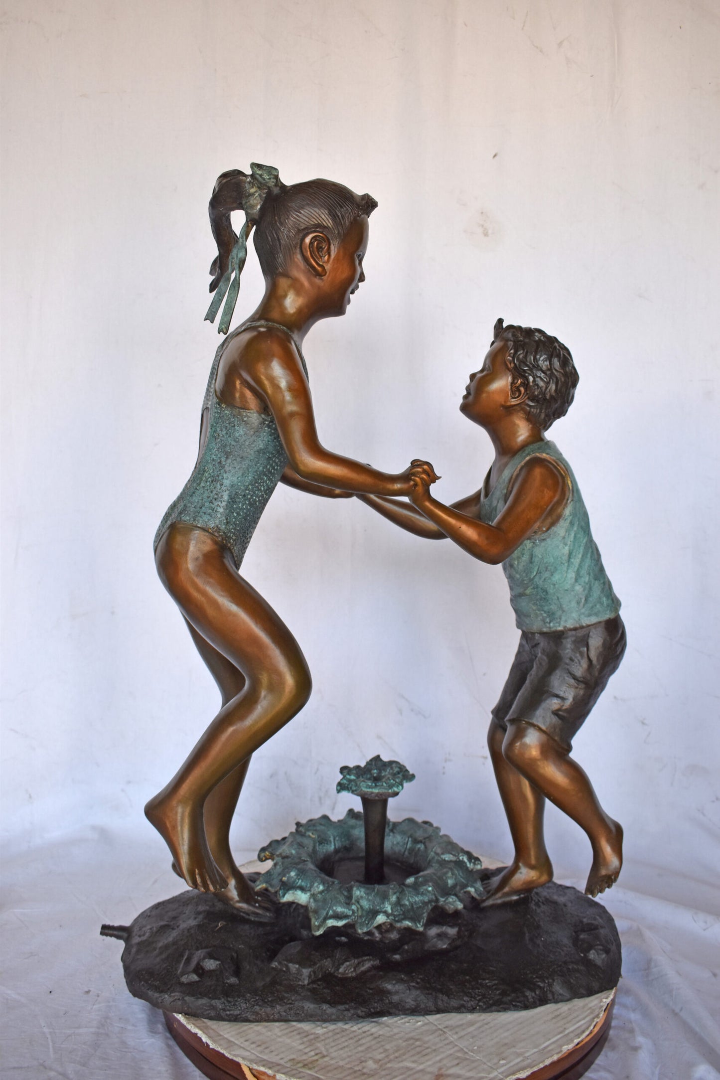 Young Boy and girl dancing around fountain bronze statue-Size 28" x 13" x 38"H