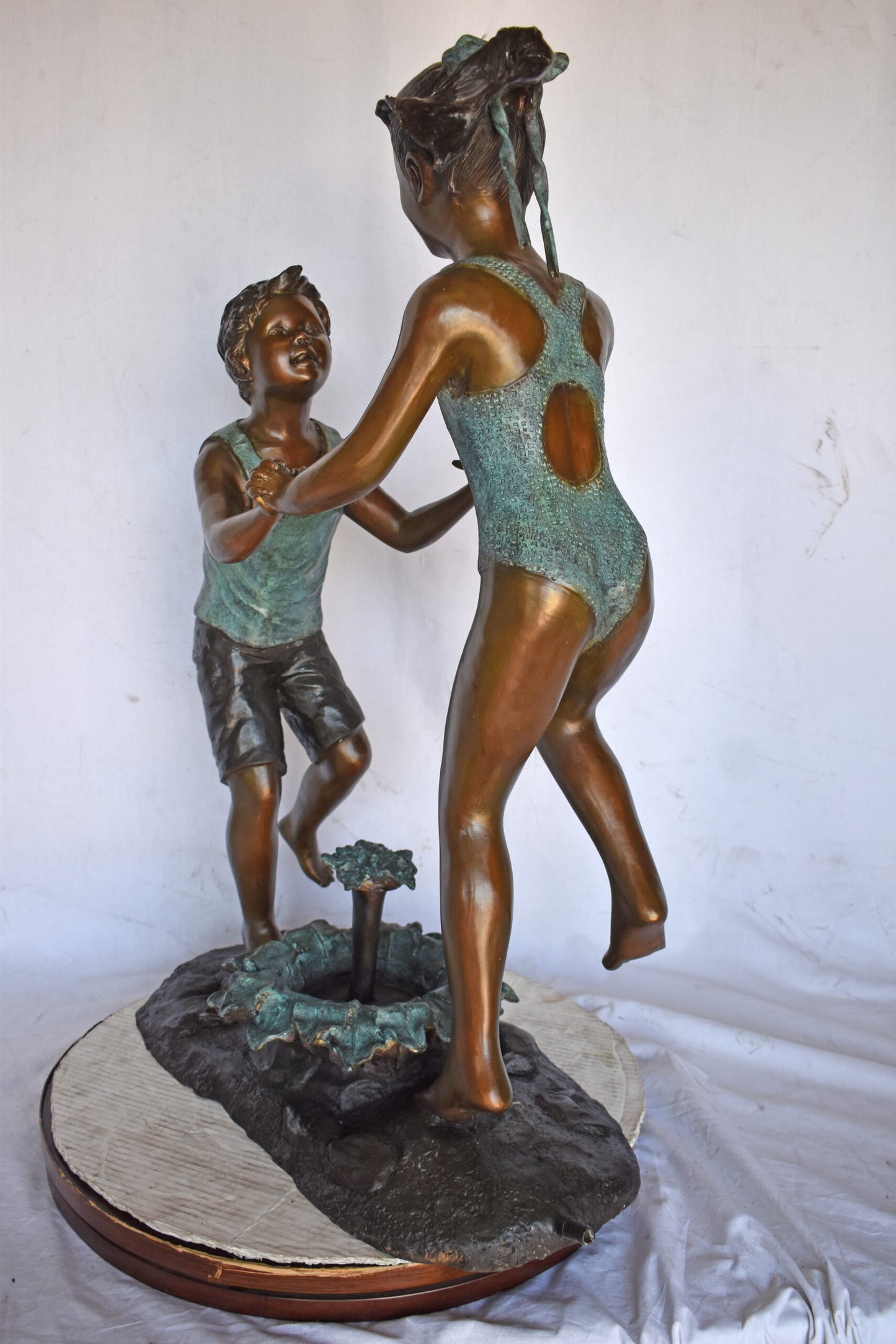 Young Boy and girl dancing around fountain bronze statue-Size 28" x 13" x 38"H