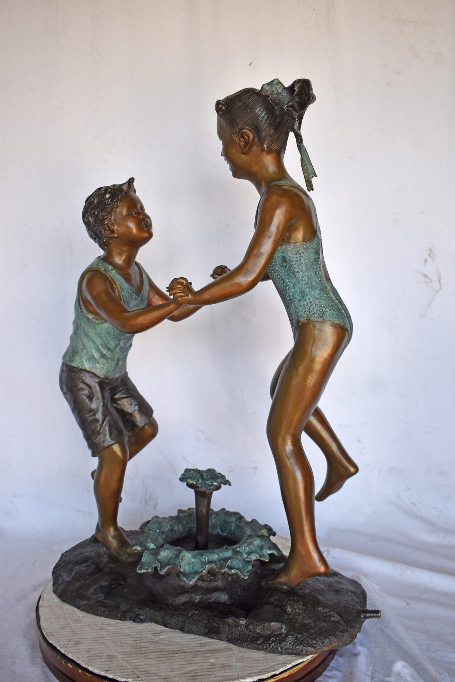 Young Boy and girl dancing around fountain bronze statue-Size 28" x 13" x 38"H