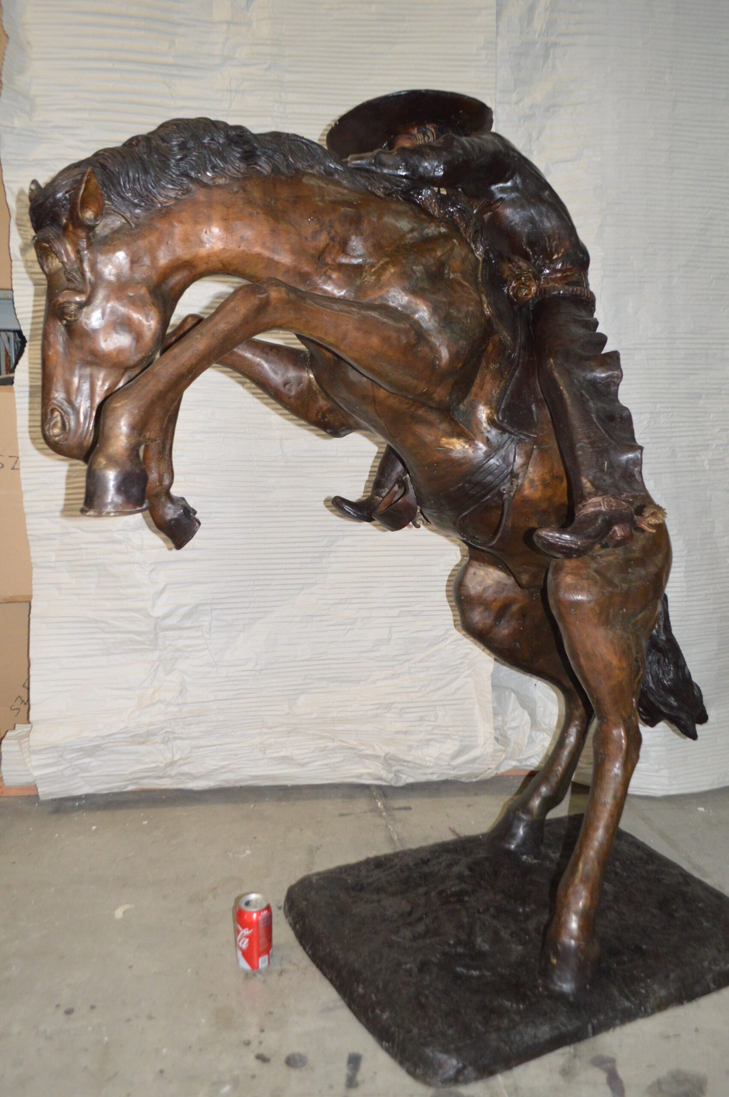Bronco Buster Giant Bronze Statue - Size: 65"L x 52"W x 64"H.