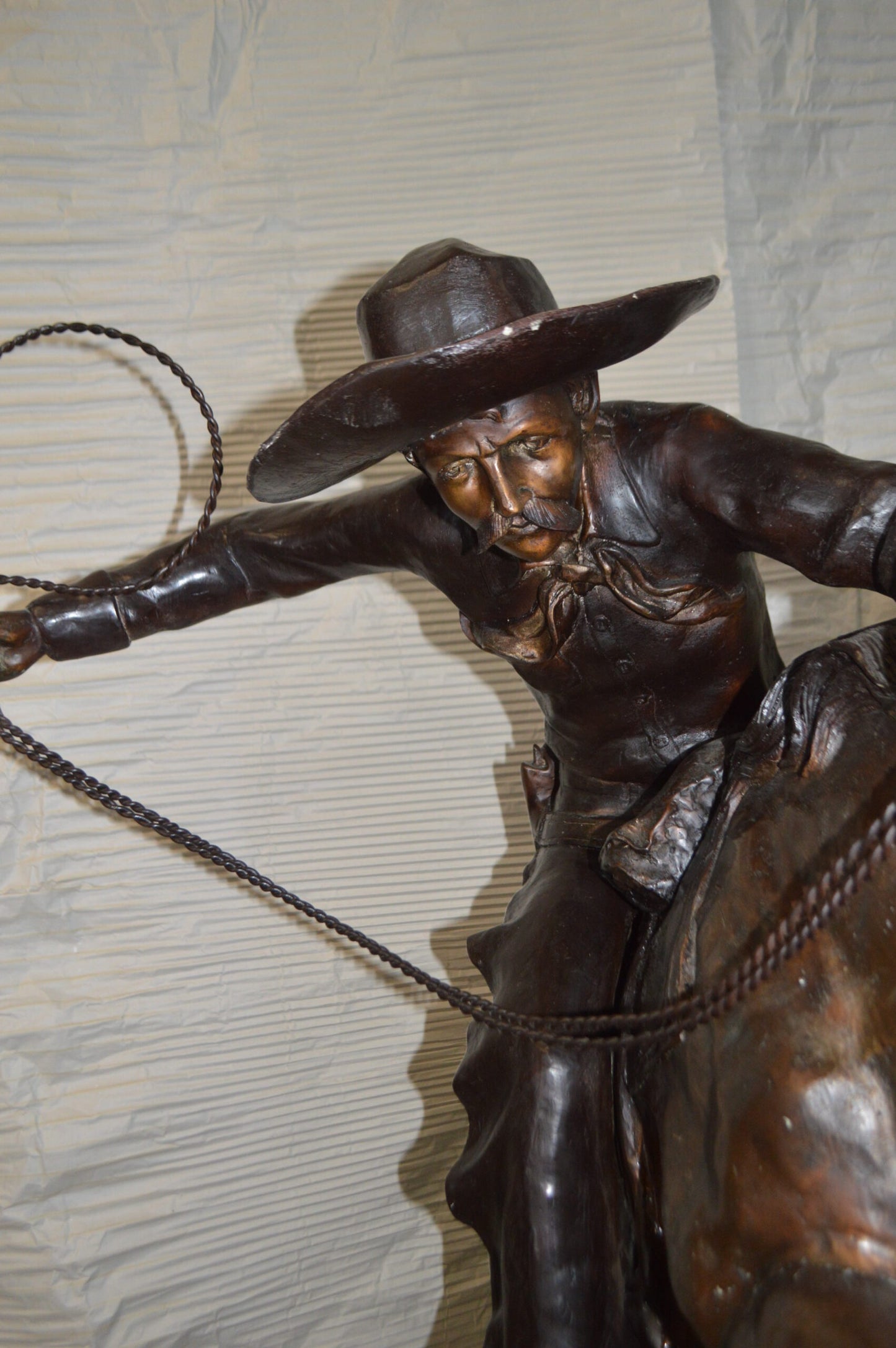 Bronco Buster Giant Bronze Statue - Size: 65"L x 52"W x 64"H.