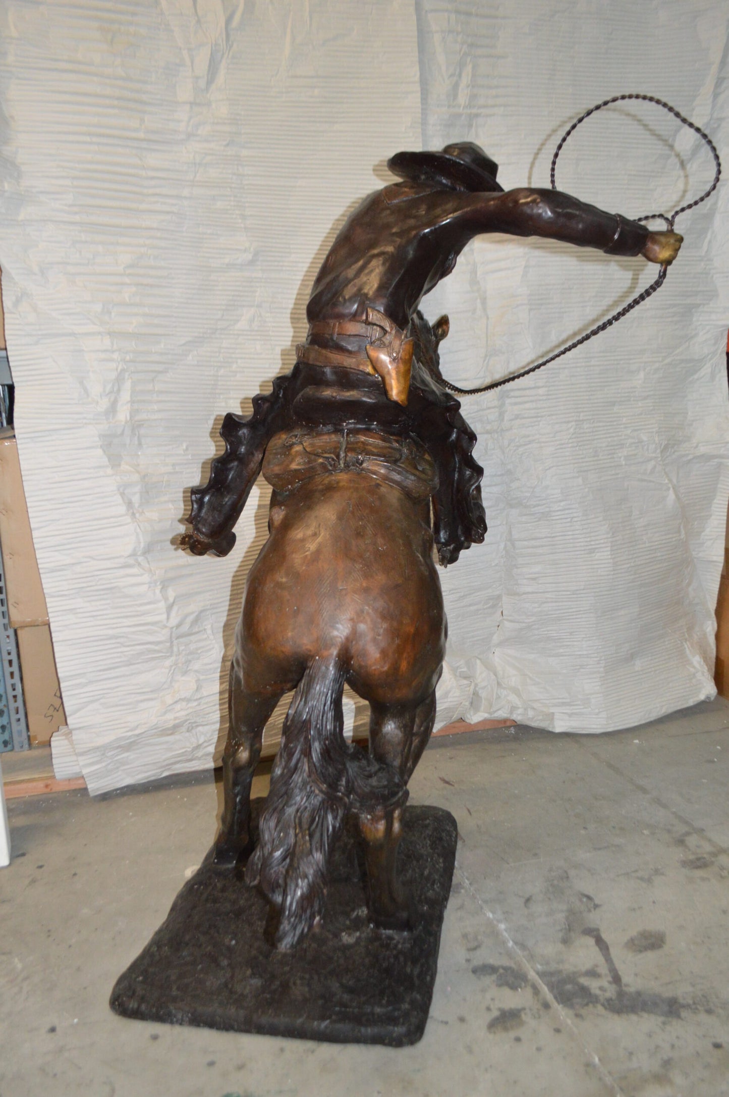 Bronco Buster Giant Bronze Statue - Size: 65"L x 52"W x 64"H.
