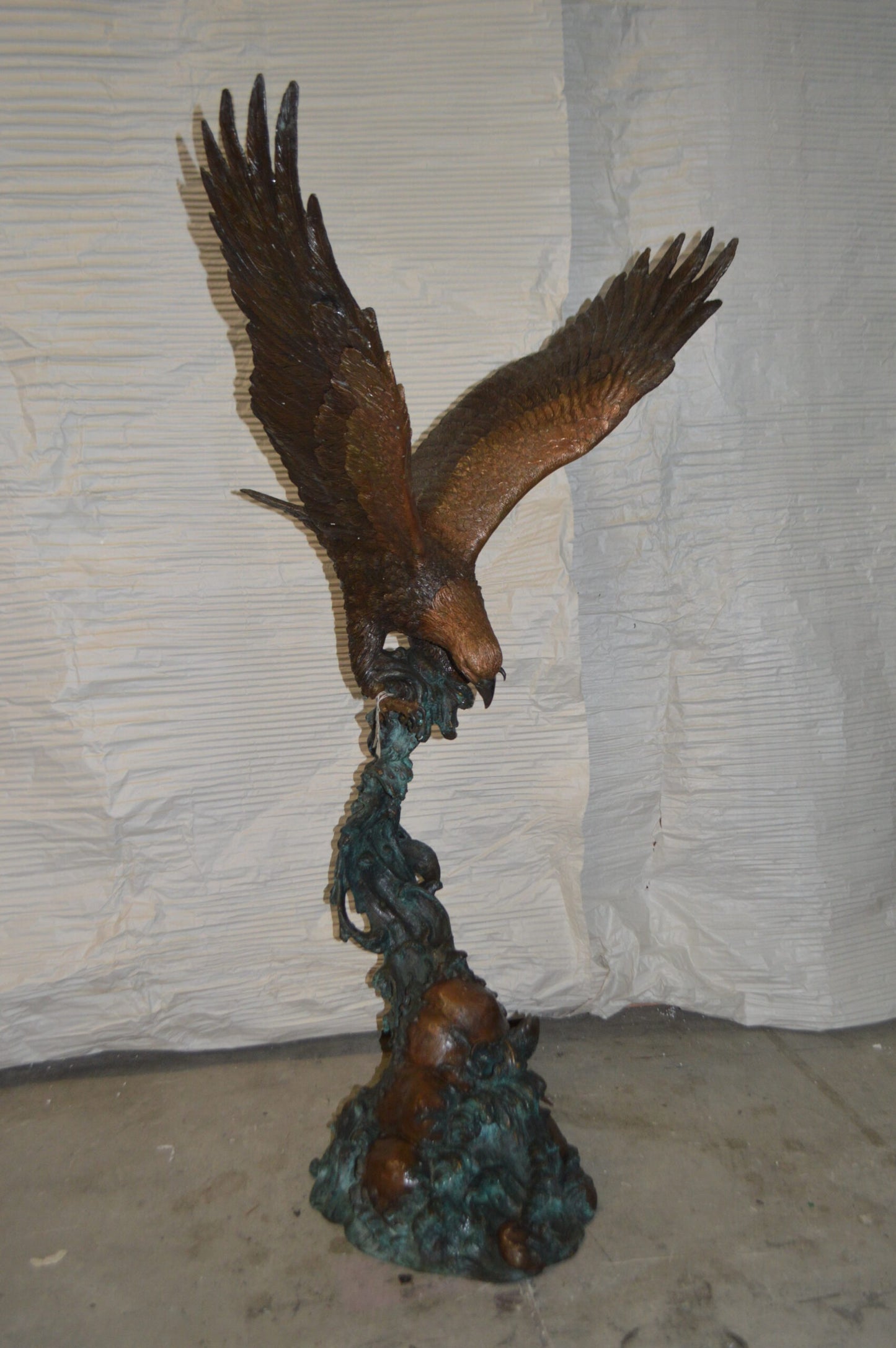 Flying Eagle on Wave Bronze Statue - Size: 25"L x 35"W x 57"H.