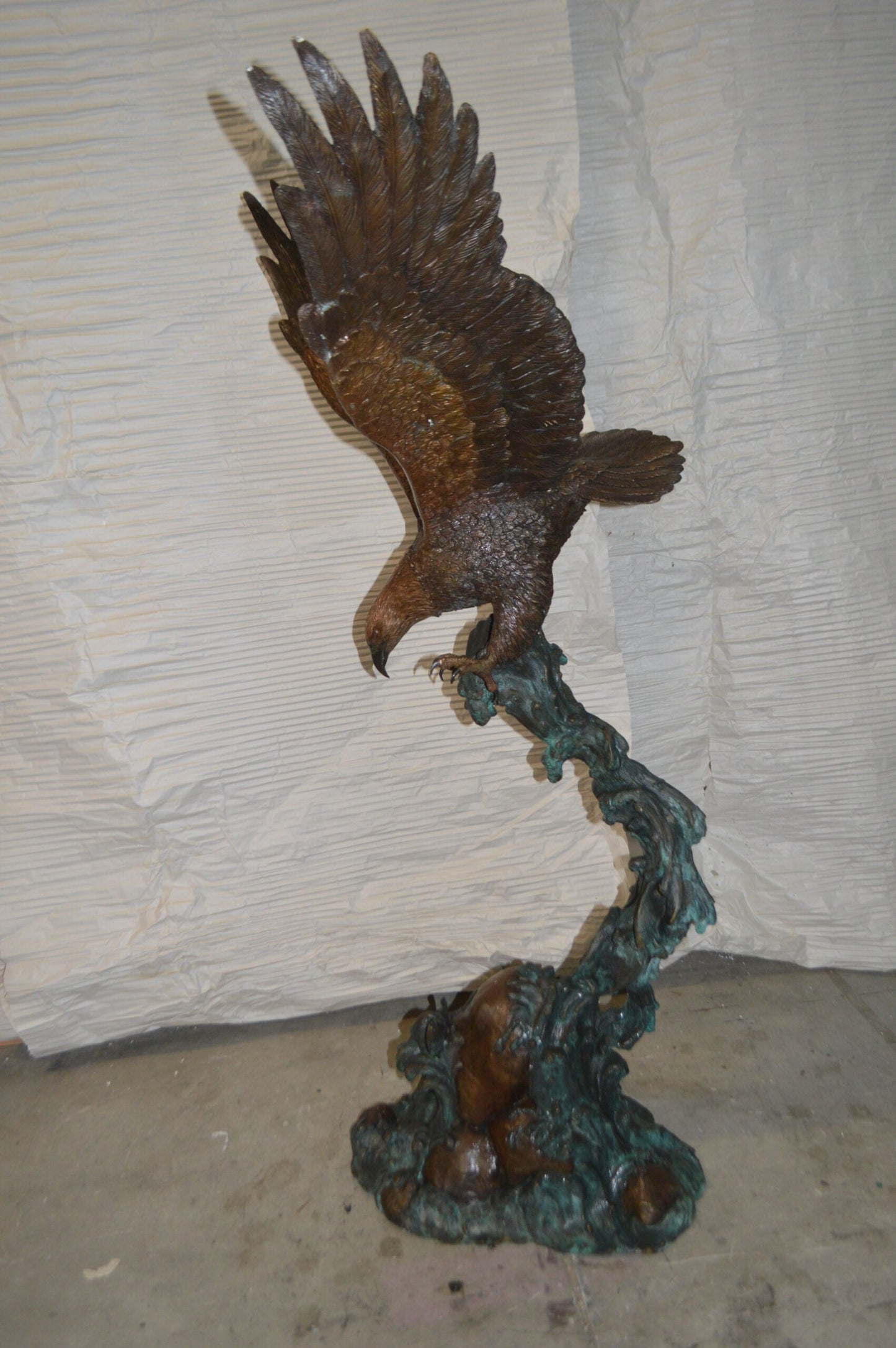 Flying Eagle on Wave Bronze Statue - Size: 25"L x 35"W x 57"H.