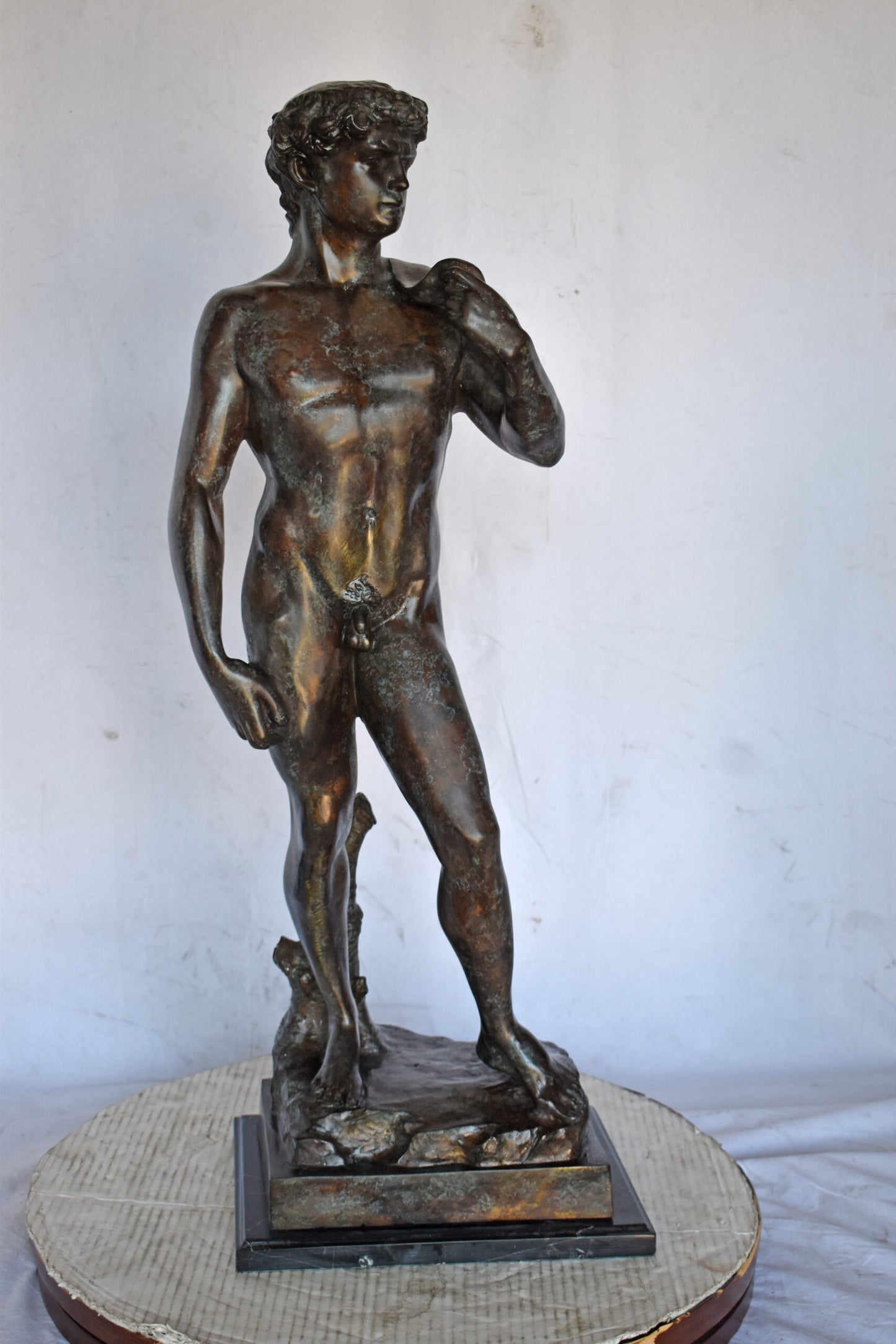 David by Michelangelo bronze statue replica - Size: 13"L x 10"W x 36"H.