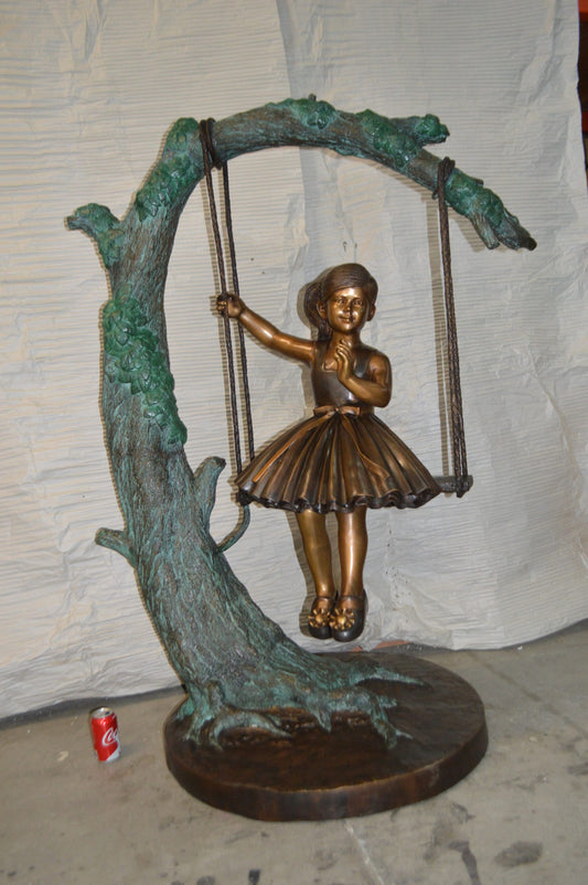 Girl on Swing 65 Bronze Statue -  Size: 44"L x 35"W x 65"H.