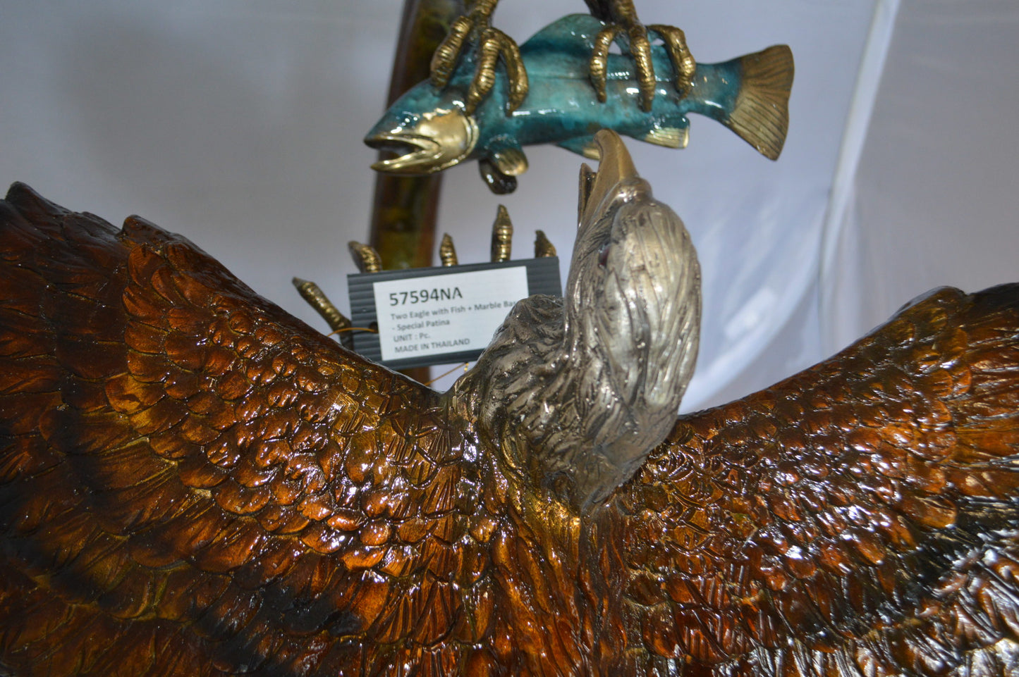 Two Eagles Fighting on Fish Bronze Statue - Size: 33"L x 28"W x 42"H.