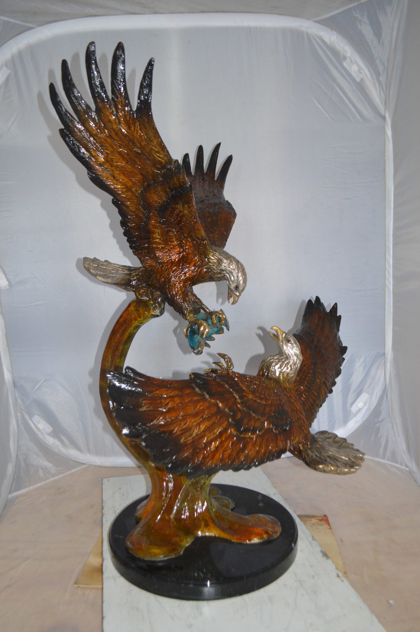 Two Eagles Fighting on Fish Bronze Statue - Size: 33"L x 28"W x 42"H.