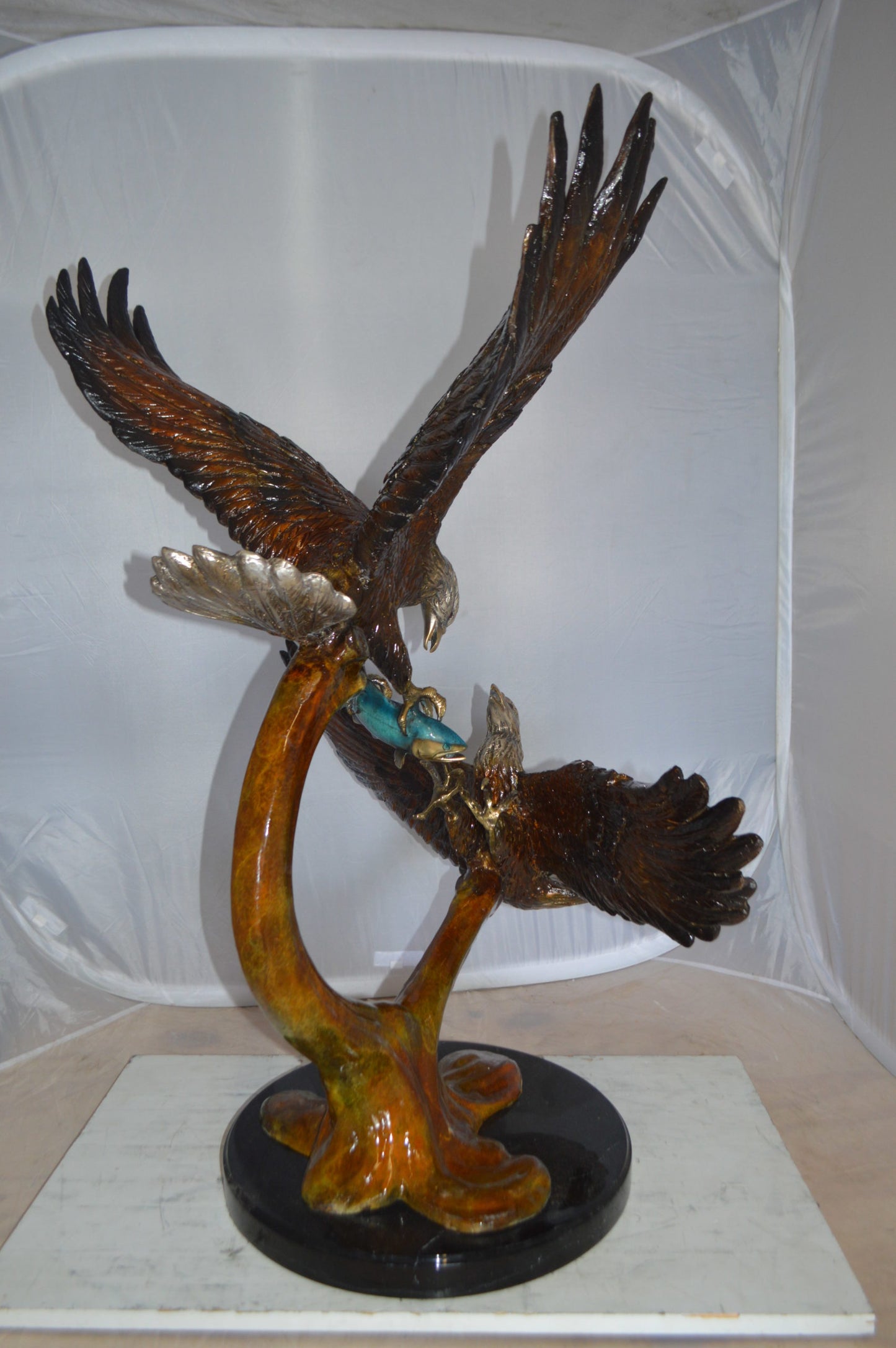 Two Eagles Fighting on Fish Bronze Statue - Size: 33"L x 28"W x 42"H.