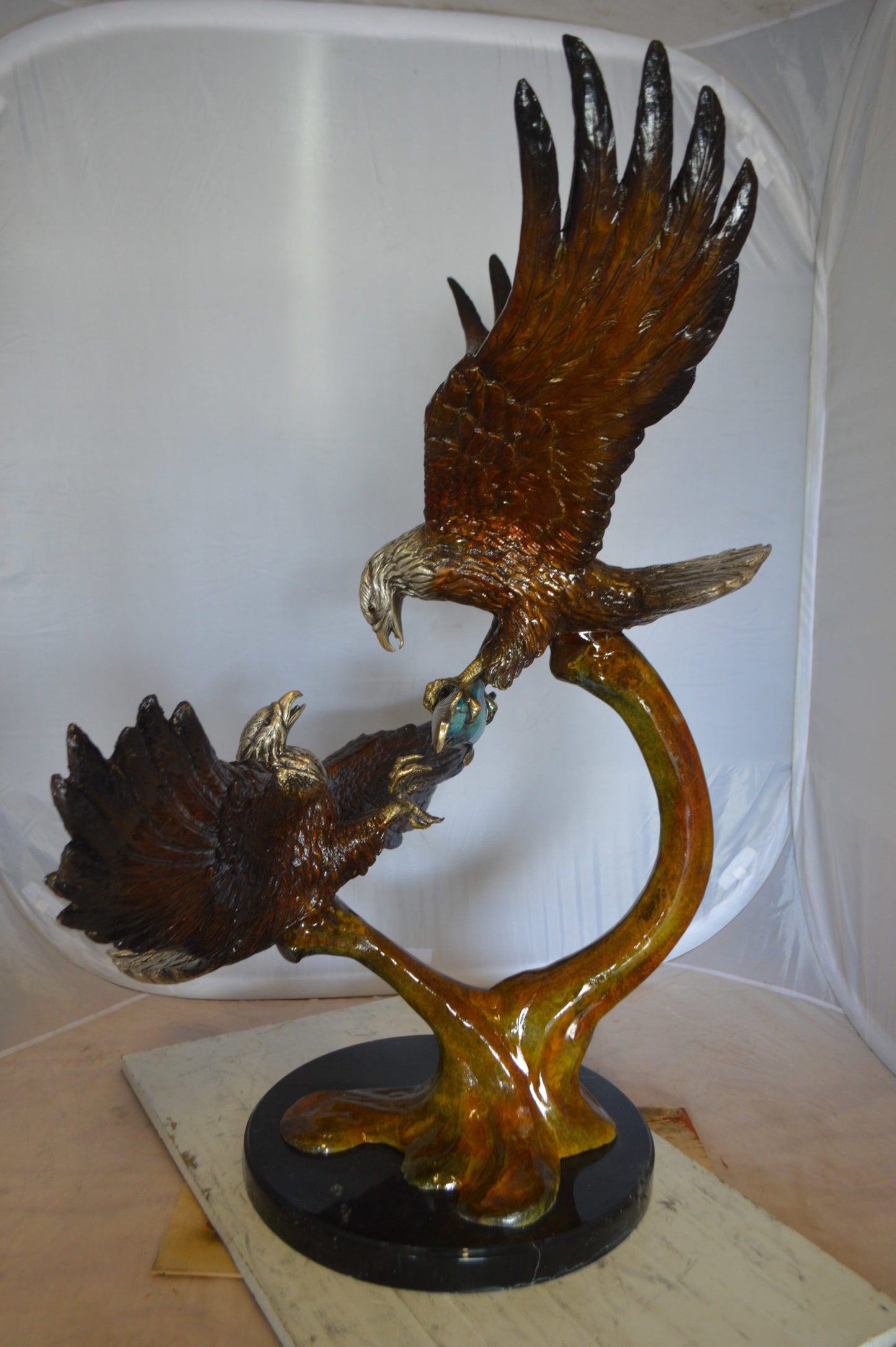 Two Eagles Fighting on Fish Bronze Statue - Size: 33"L x 28"W x 42"H.