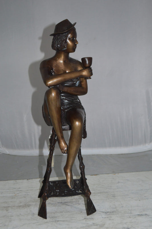 Lady W Champagne Glass Bronze Statue - Size: 8"L x 6"W x 22"H.