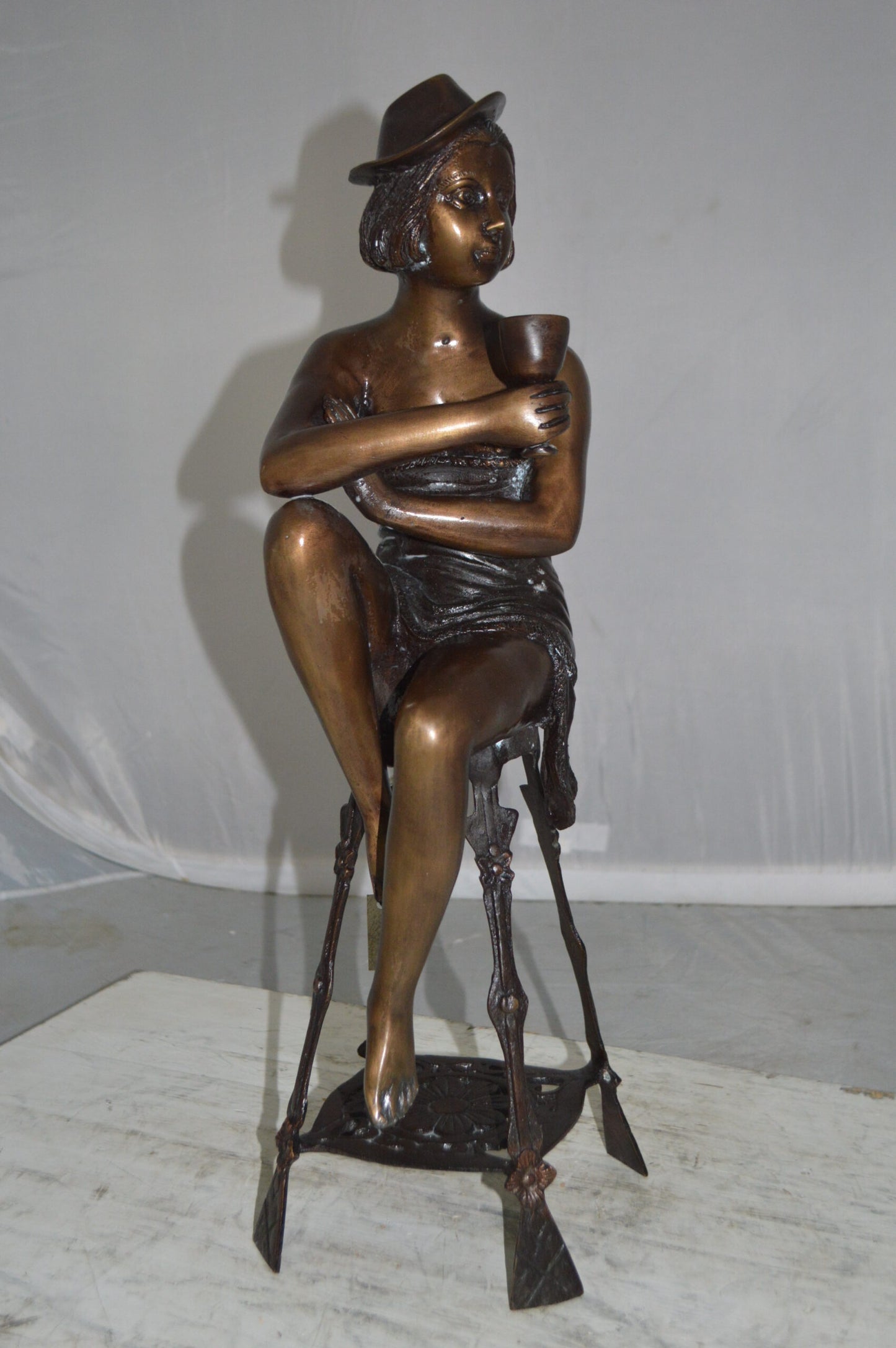 Lady W Champagne Glass Bronze Statue - Size: 8"L x 6"W x 22"H.