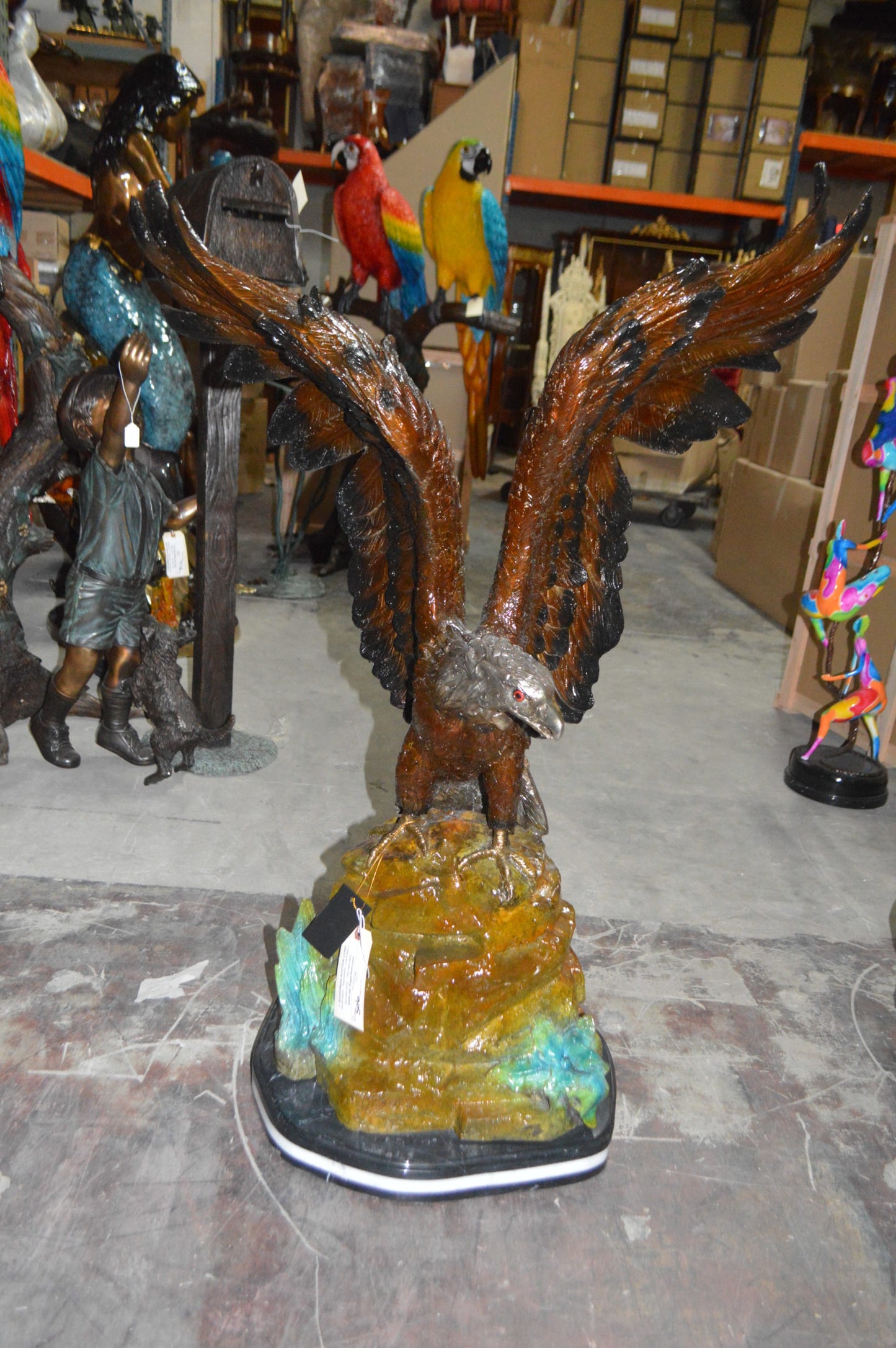 Eagle On A Rock Bronze Statue - Size: 32"L x 18"W x 48"H.