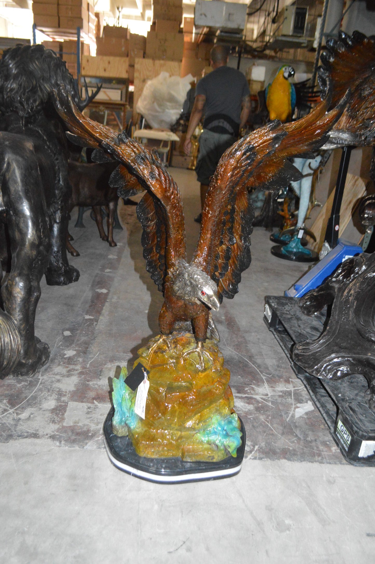Eagle On A Rock Bronze Statue - Size: 32"L x 18"W x 48"H.