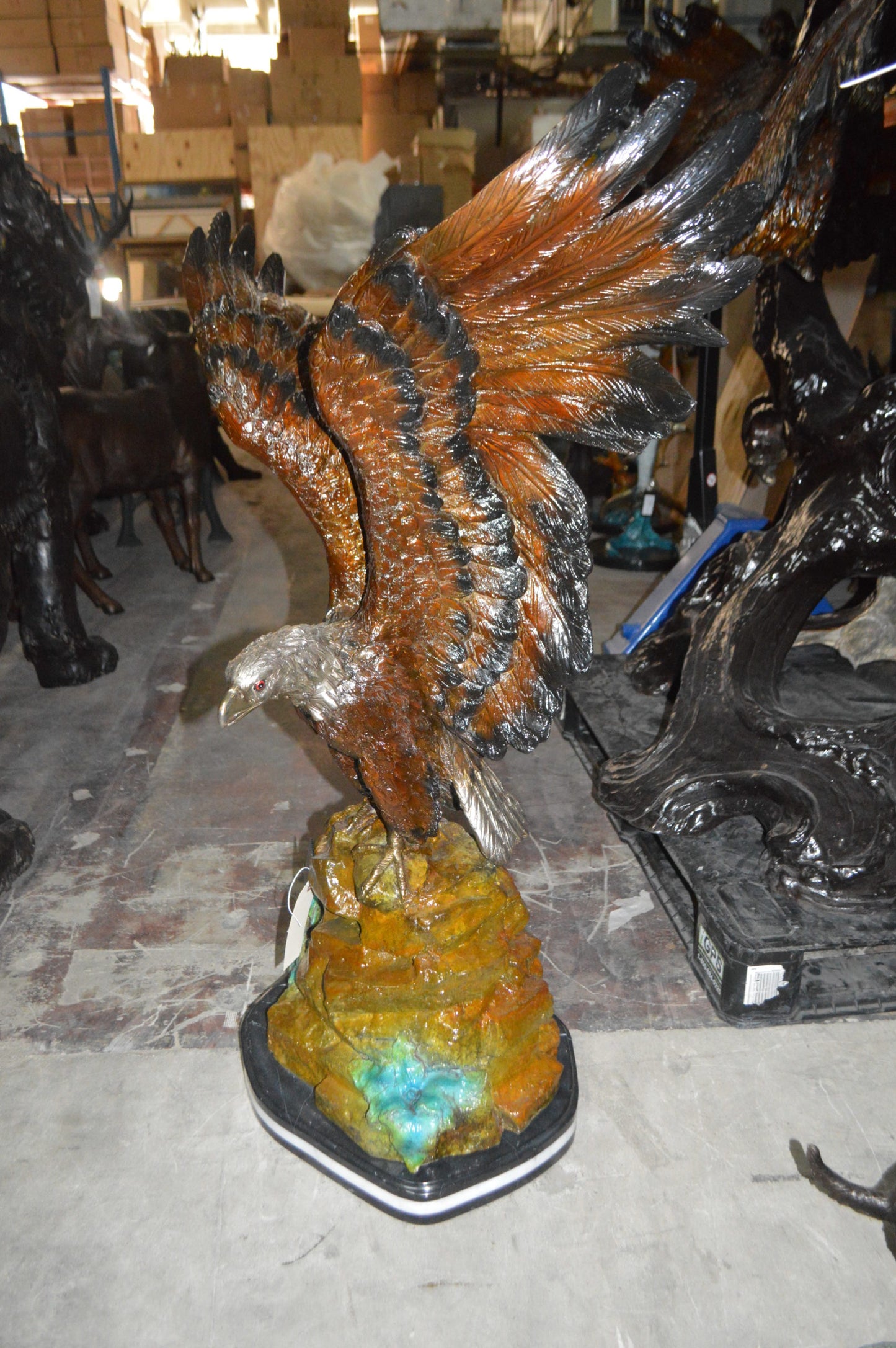 Eagle On A Rock Bronze Statue - Size: 32"L x 18"W x 48"H.