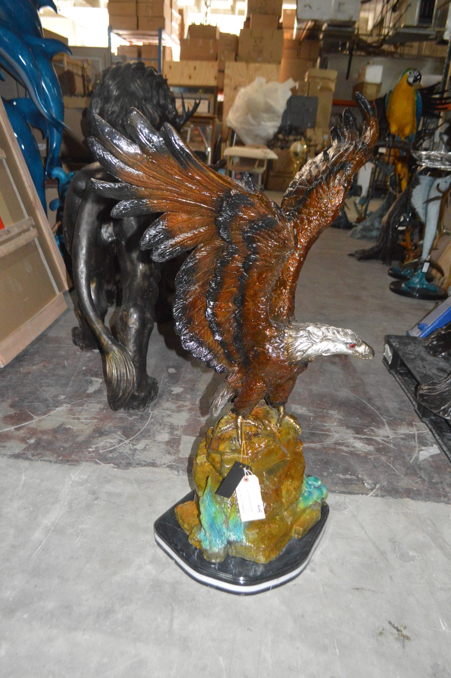Eagle On A Rock Bronze Statue - Size: 32"L x 18"W x 48"H.