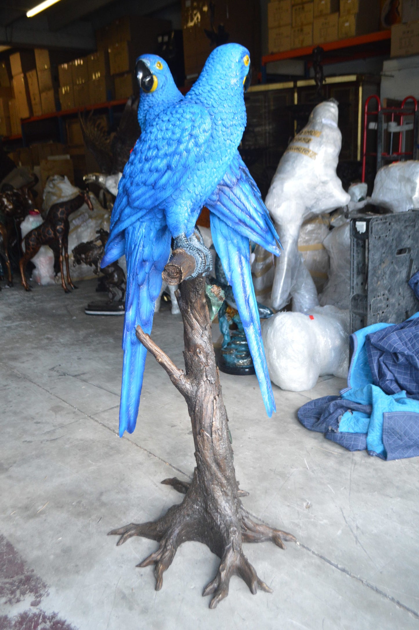 Pair of Blue Parrots on a tree - Bronze Statue - Size: 43"L x 28"W x 67"H.